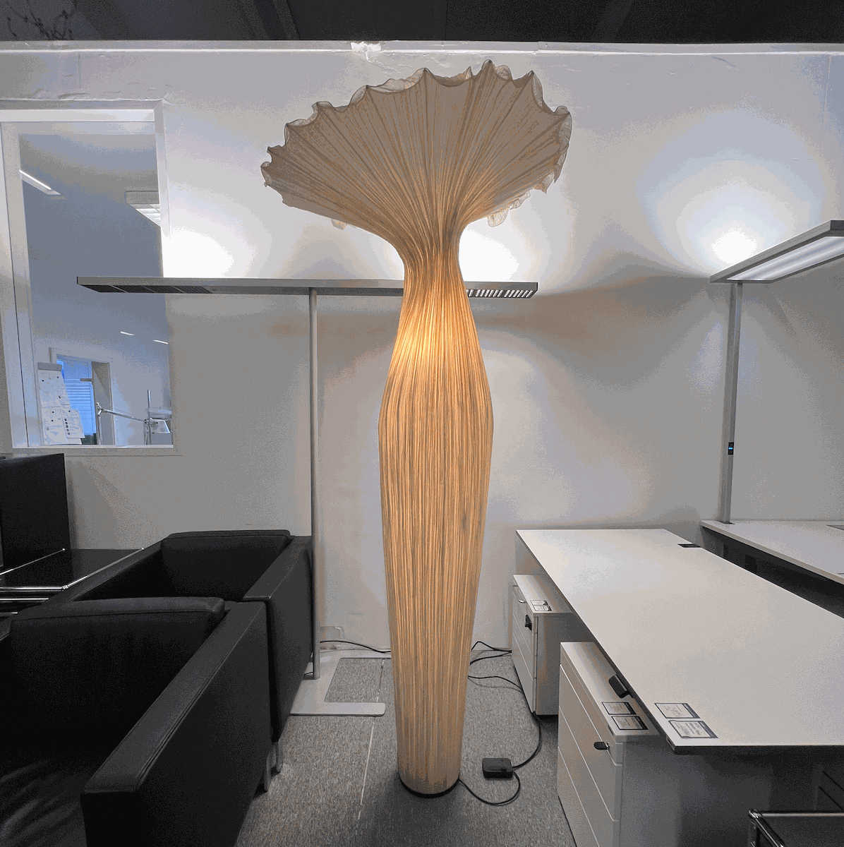 Acqua Creation Morning Glory dimmable floor lamp with sculptural design in office setting