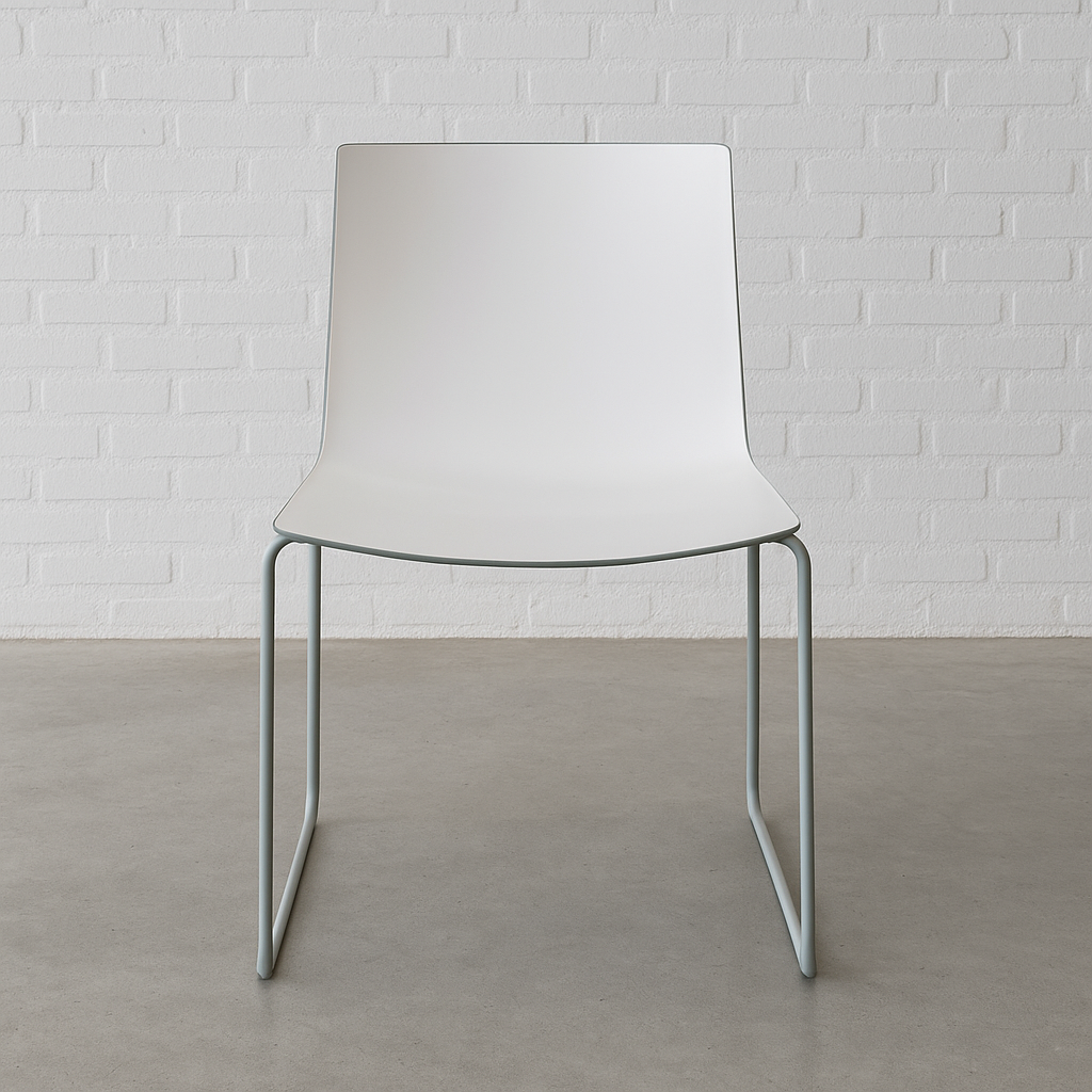 Arper Catifa 46 chair with white seat and steel sled base against white brick wall