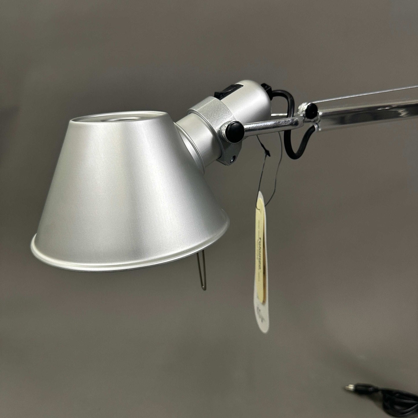 Artemide Tolomeo Tavolo polished aluminum table lamp with adjustable arm and 23cm stand base, E27 bulb socket, new condition