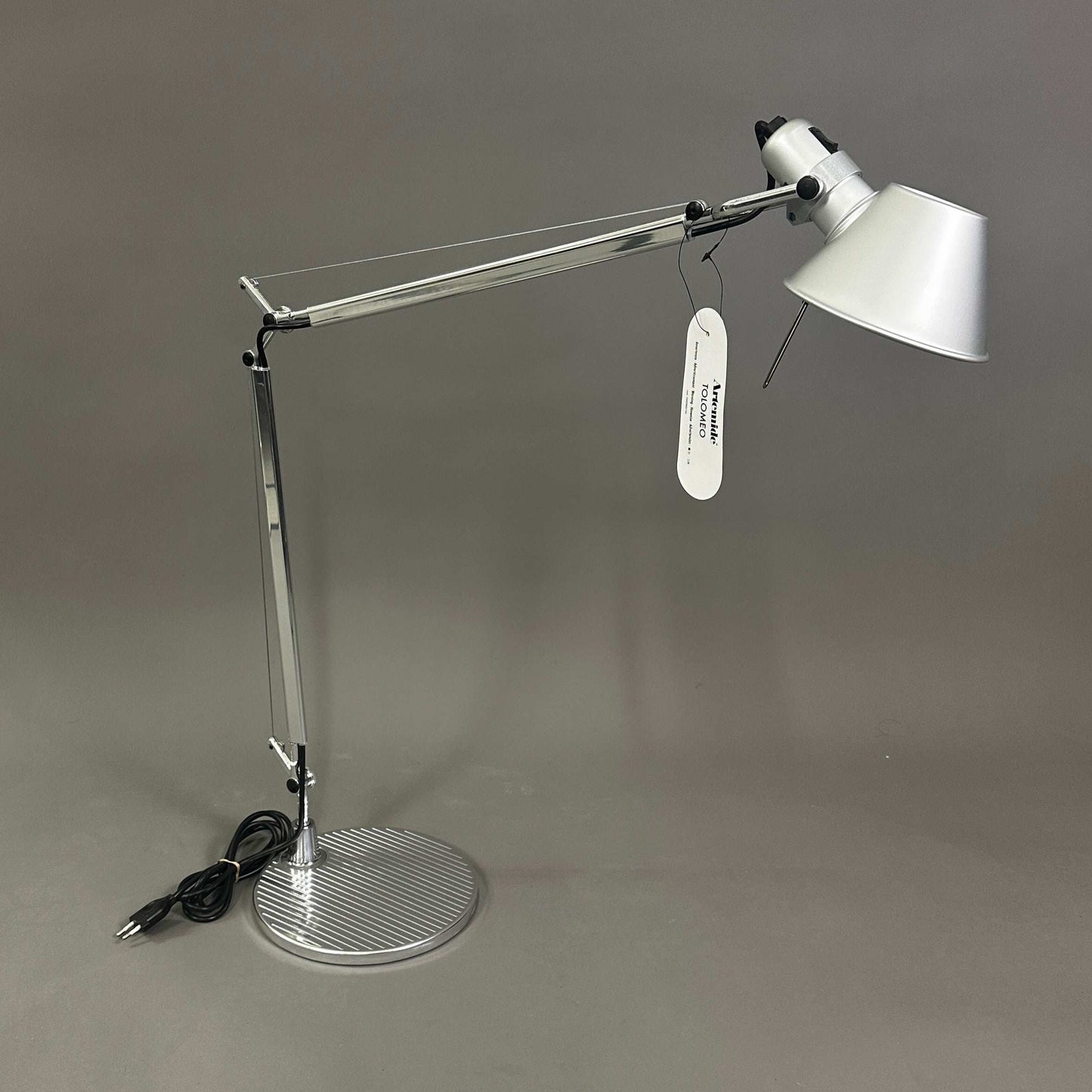 Artemide Tolomeo Tavolo polished aluminum adjustable desk lamp with round stand and conical shade