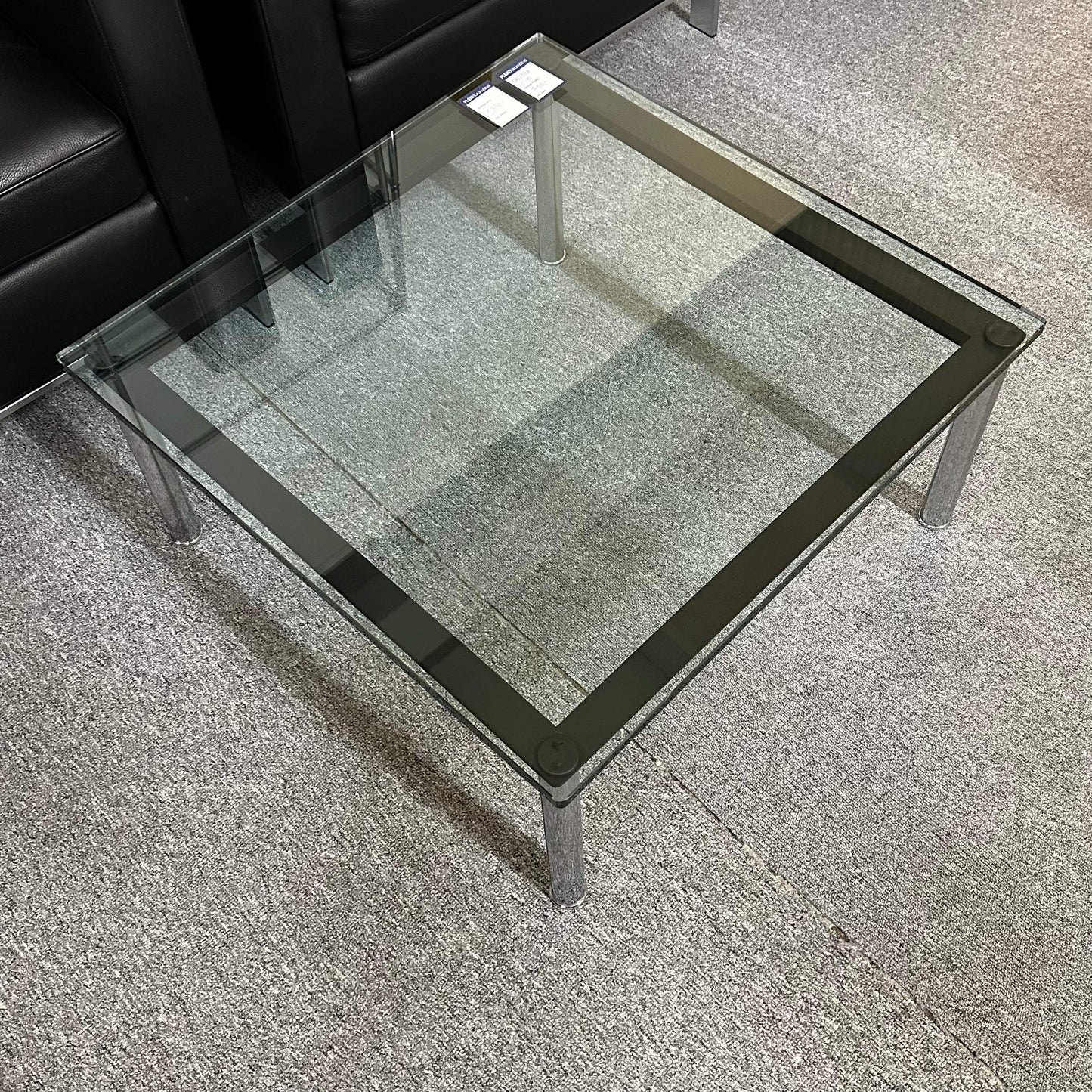 Square Cassina glass coffee table with metal legs in excellent used condition, 70x70x33 cm