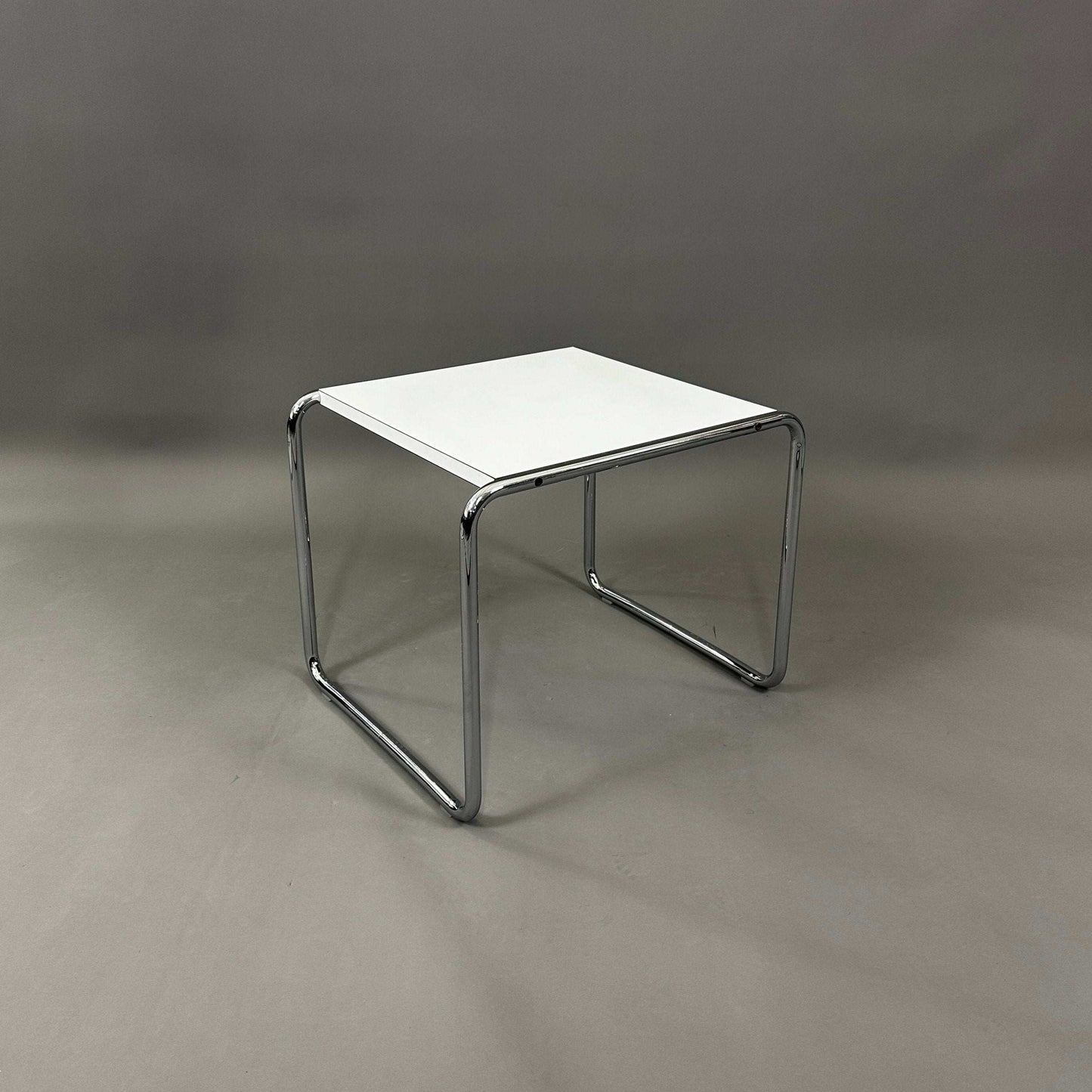 Knoll Breuer Laccio side table with white lacquered top and chrome-plated tubular steel frame