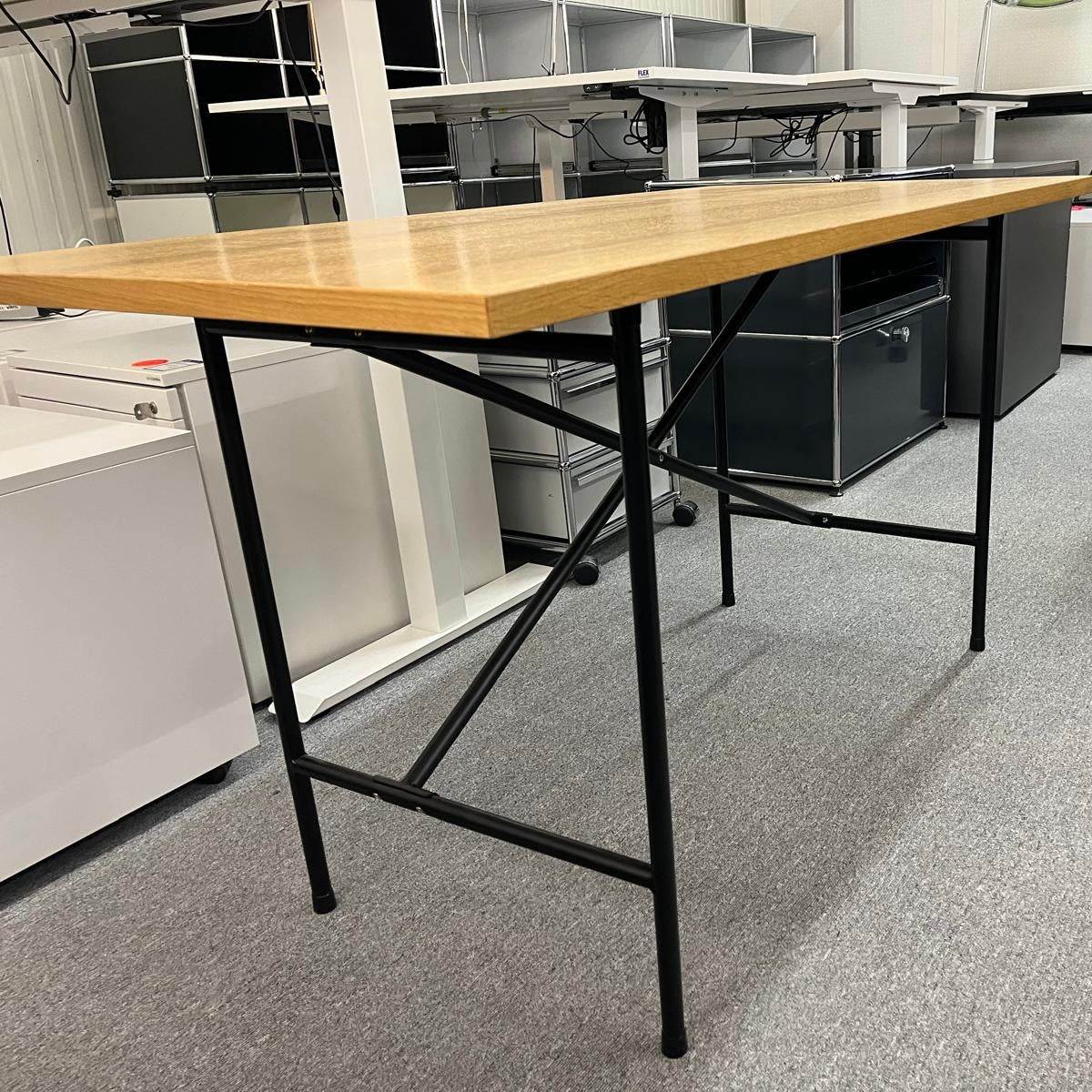 Lampert Eiermann desk with black metal frame and oak veneer tabletop measuring 140x70cm in modern office setting