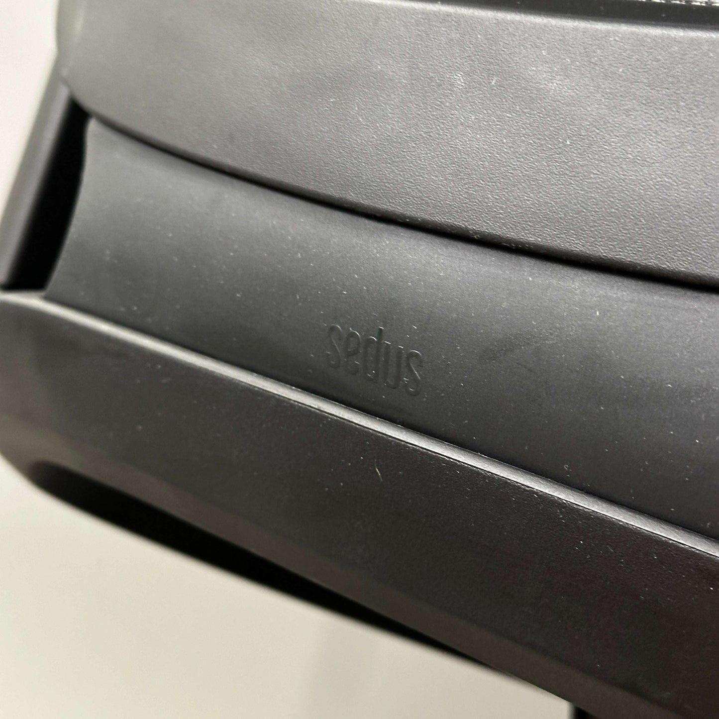 Close-up of black SEDUS se:flex office chair with adjustable ergonomic features and solid build quality
