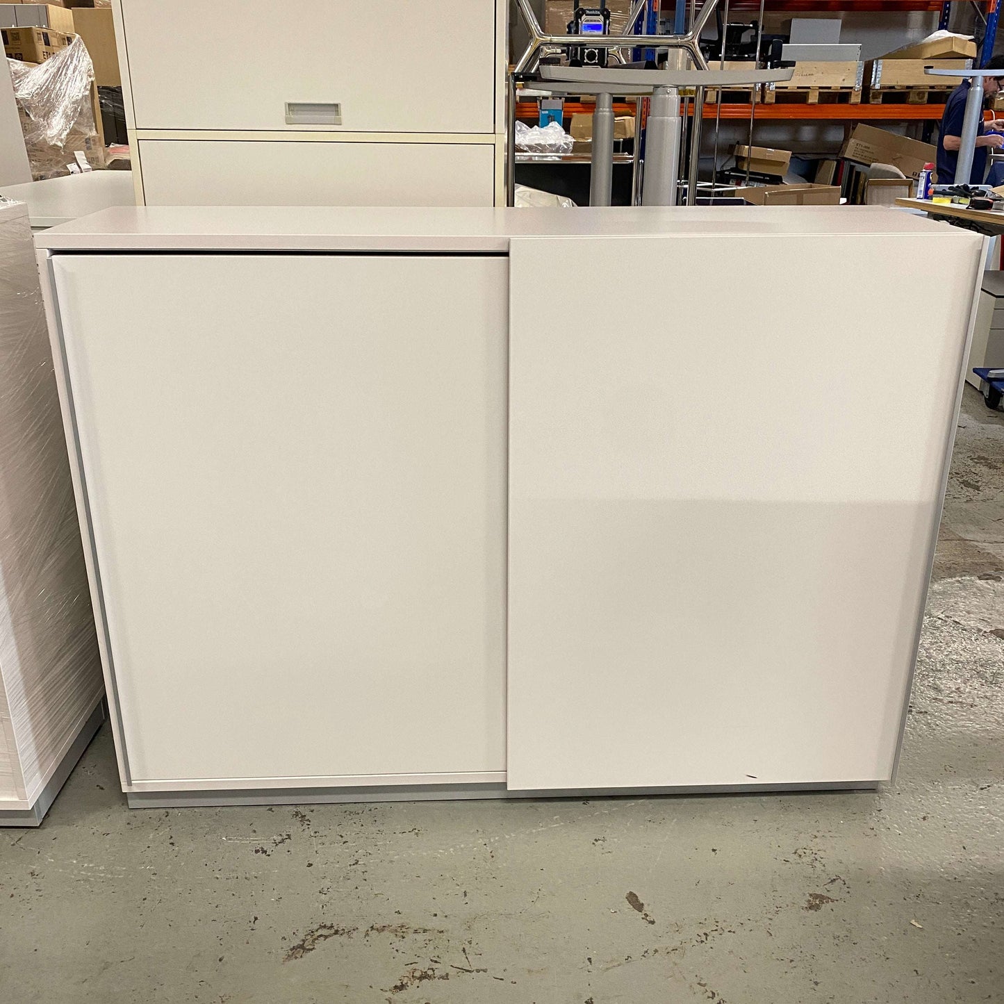 White sideboard 120cm with three open compartments and sliding doors in modern design