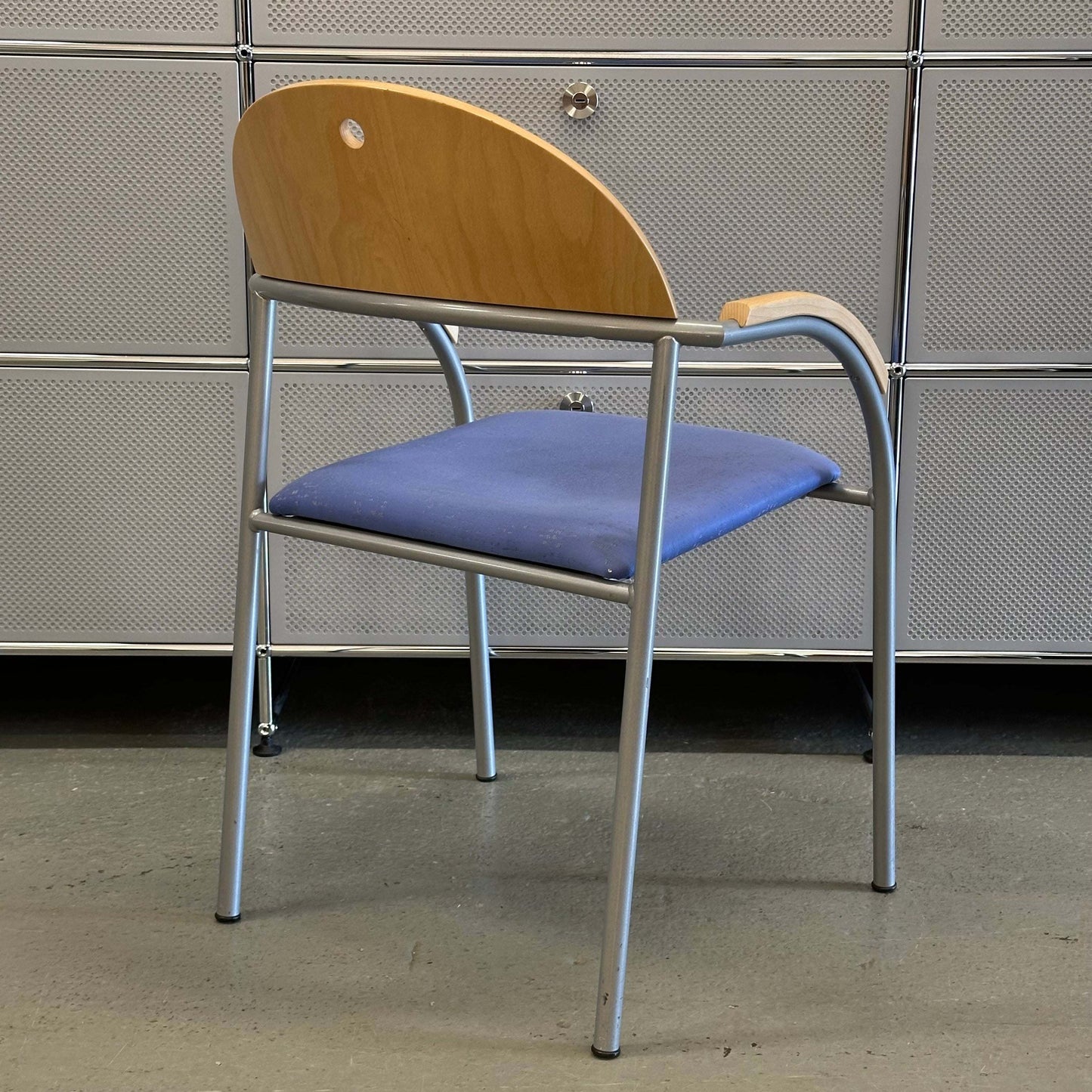Blue fabric stackable chair with beech wood backrest and silver metal frame stapelstuhl buche