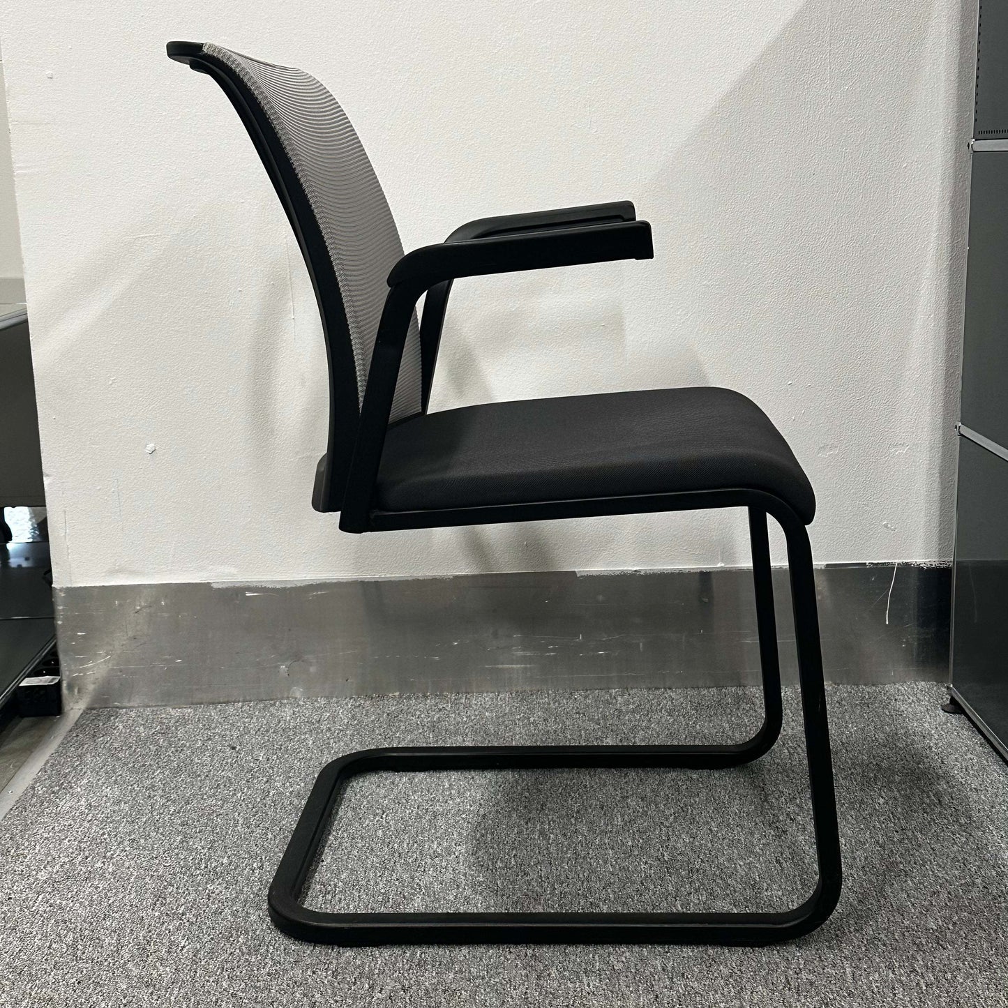 Steelcase Eastside Freischwinger ergonomic black office chair with mesh back and cantilever frame