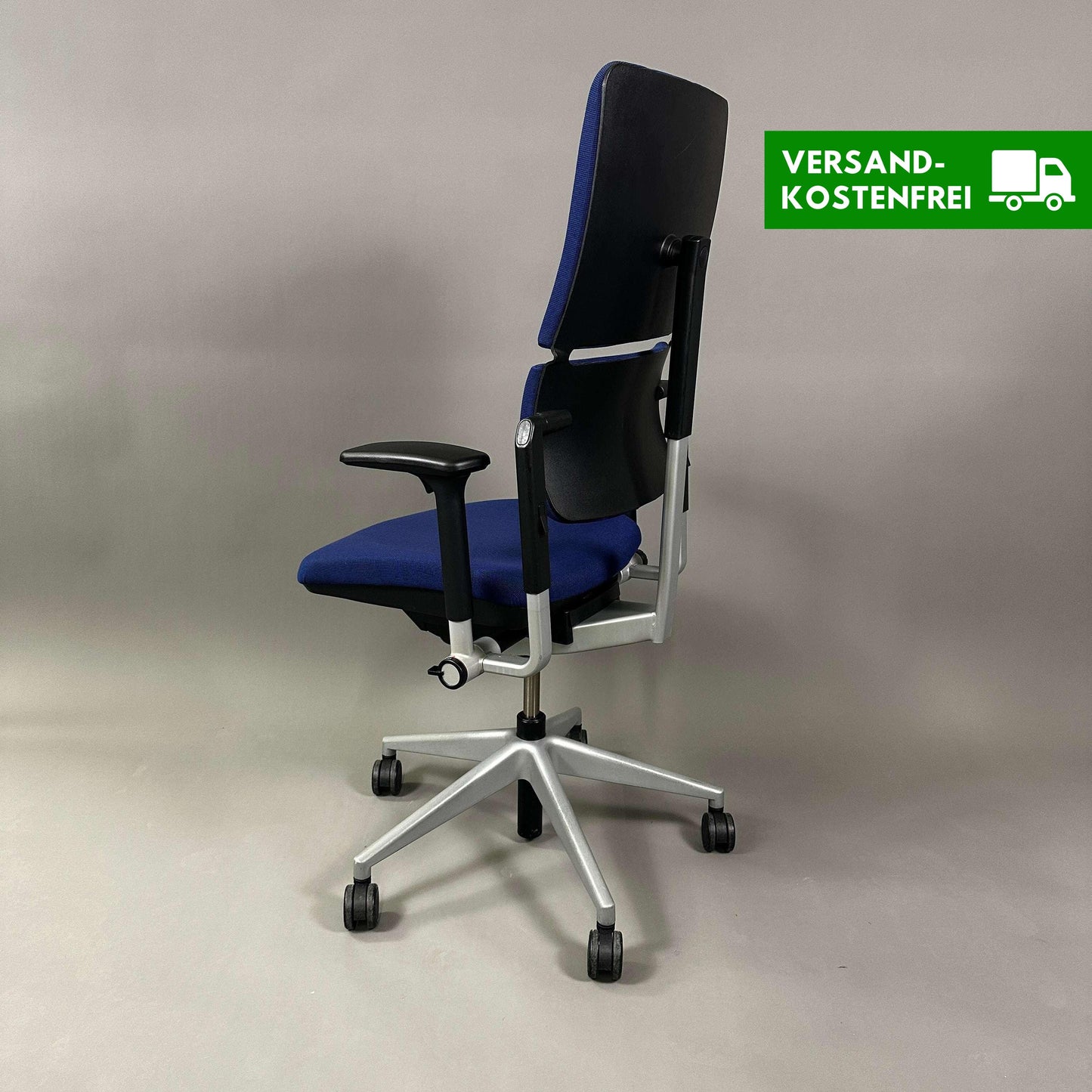 Steelcase Please ergonomic office chair in blue with adjustable height, armrests, and lumbar support on silver metal frame