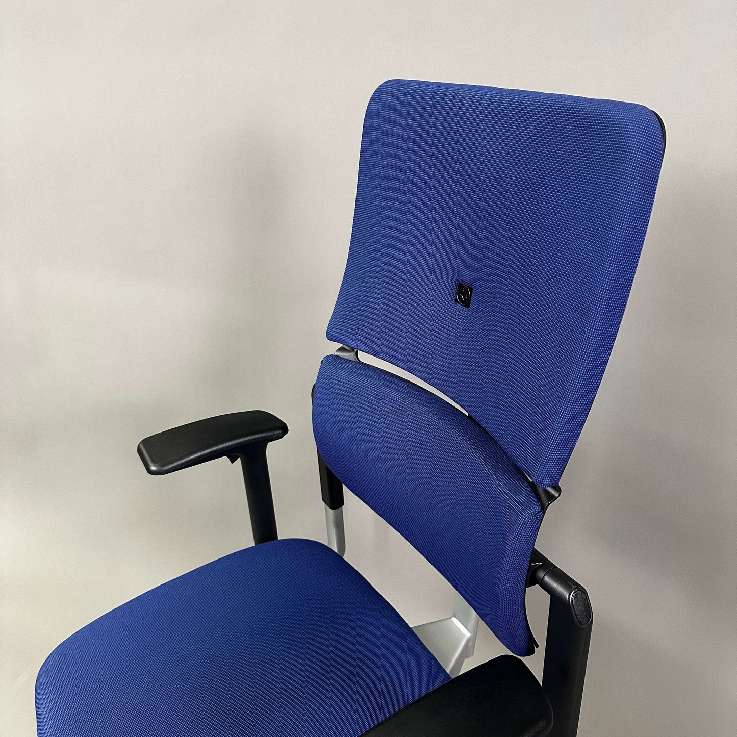 Steelcase Please ergonomic office chair in blue with adjustable armrests and lumbar support