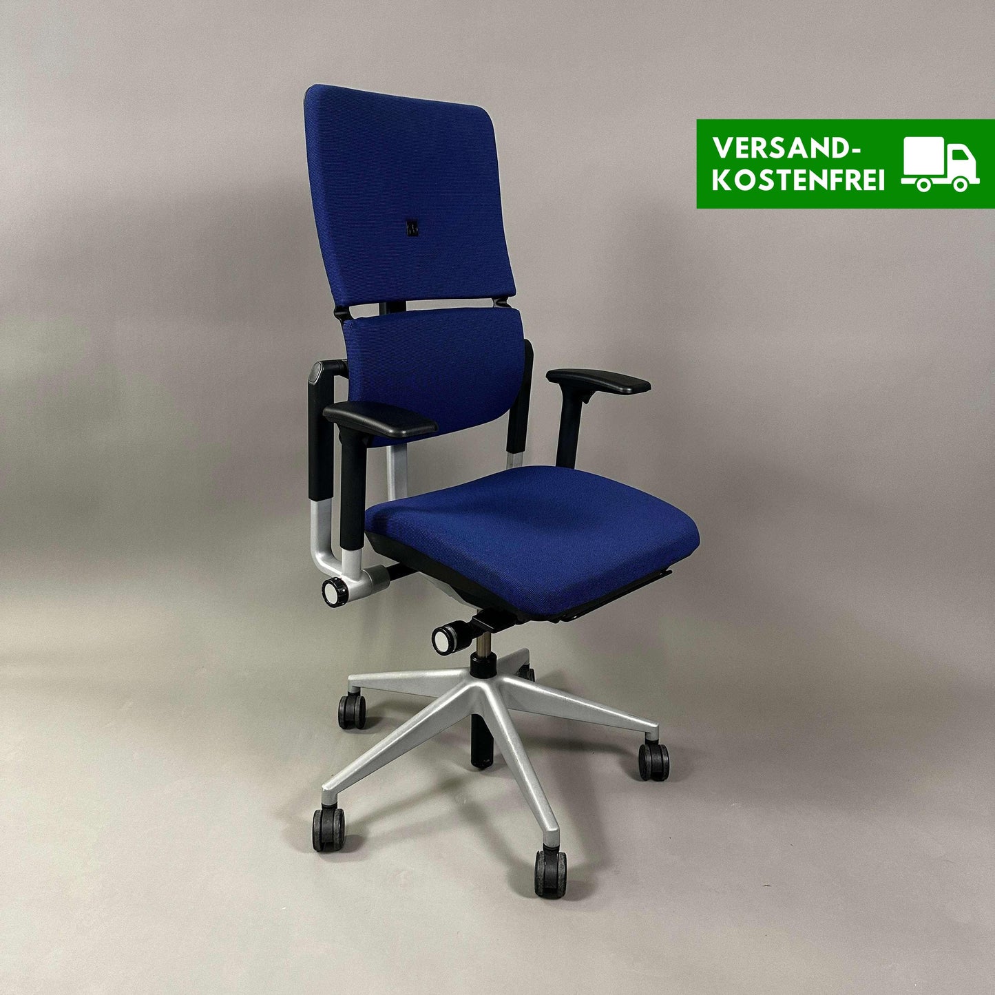 Steelcase Please ergonomic blue office chair with adjustable armrests and silver metal frame