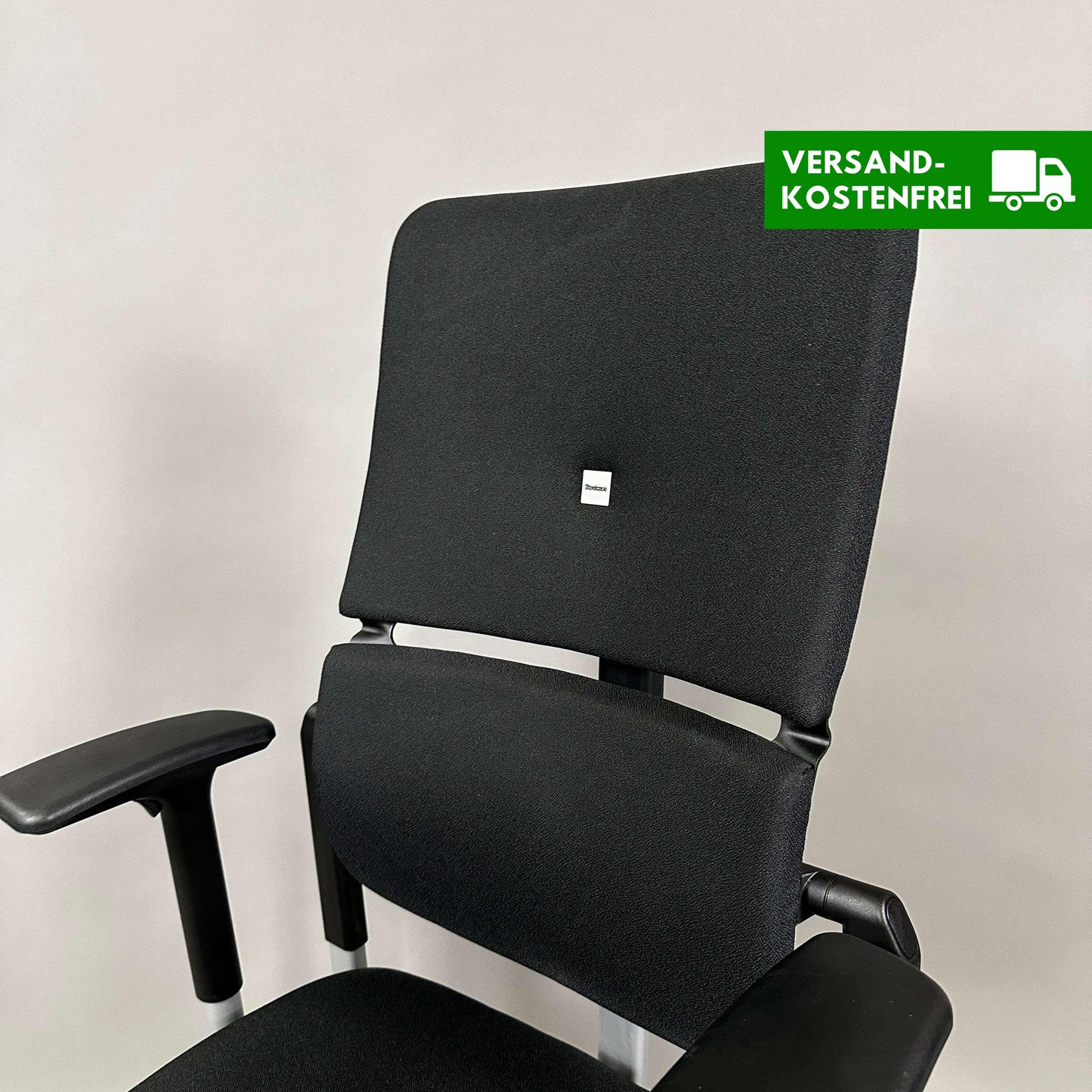 Steelcase Please V2 ergonomic office chair in black with adjustable armrests and lumbar support