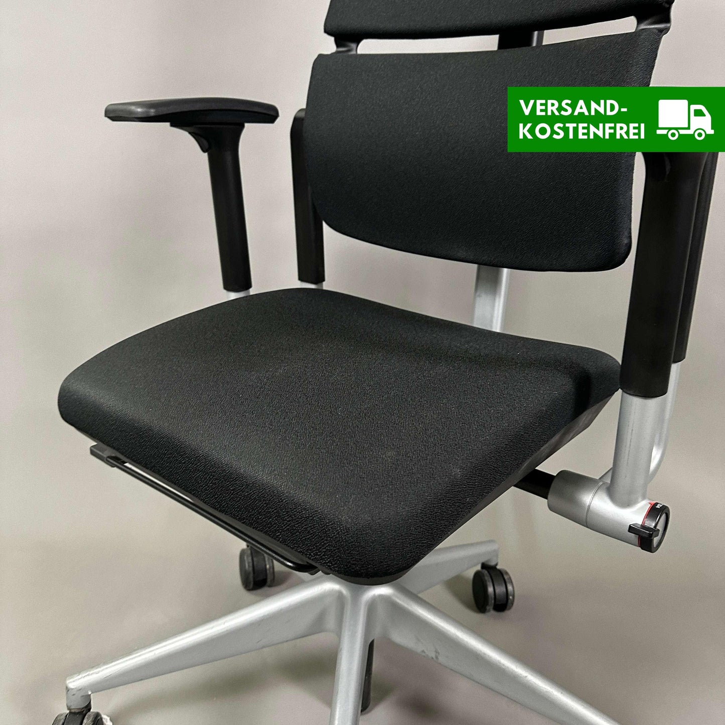 Steelcase Please black office chair with adjustable armrests and lumbar support on silver base