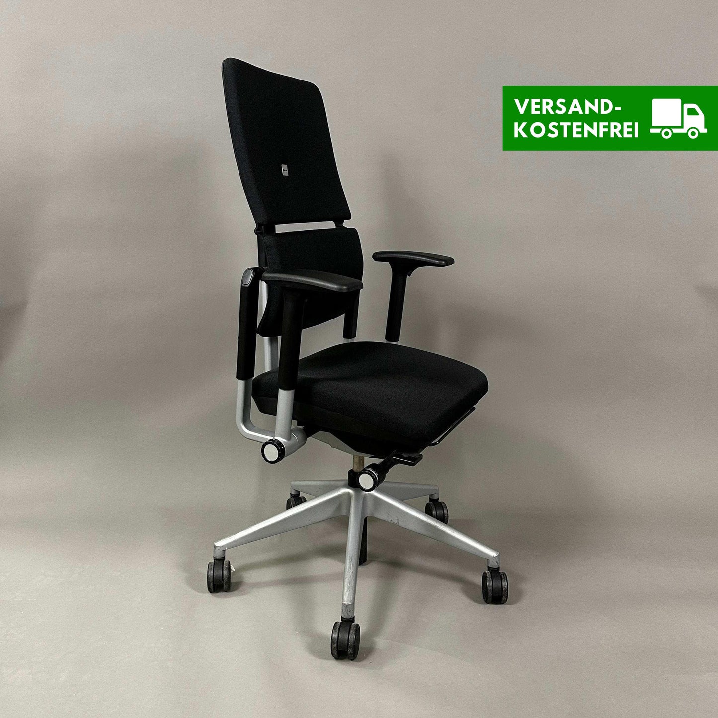 Steelcase Please V2 ergonomic office chair in black with silver base and adjustable features