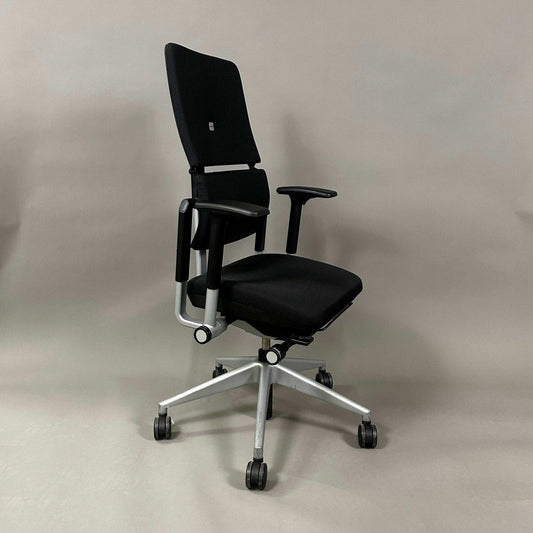 Steelcase Please V2 ergonomic office chair in black with silver base and adjustable features