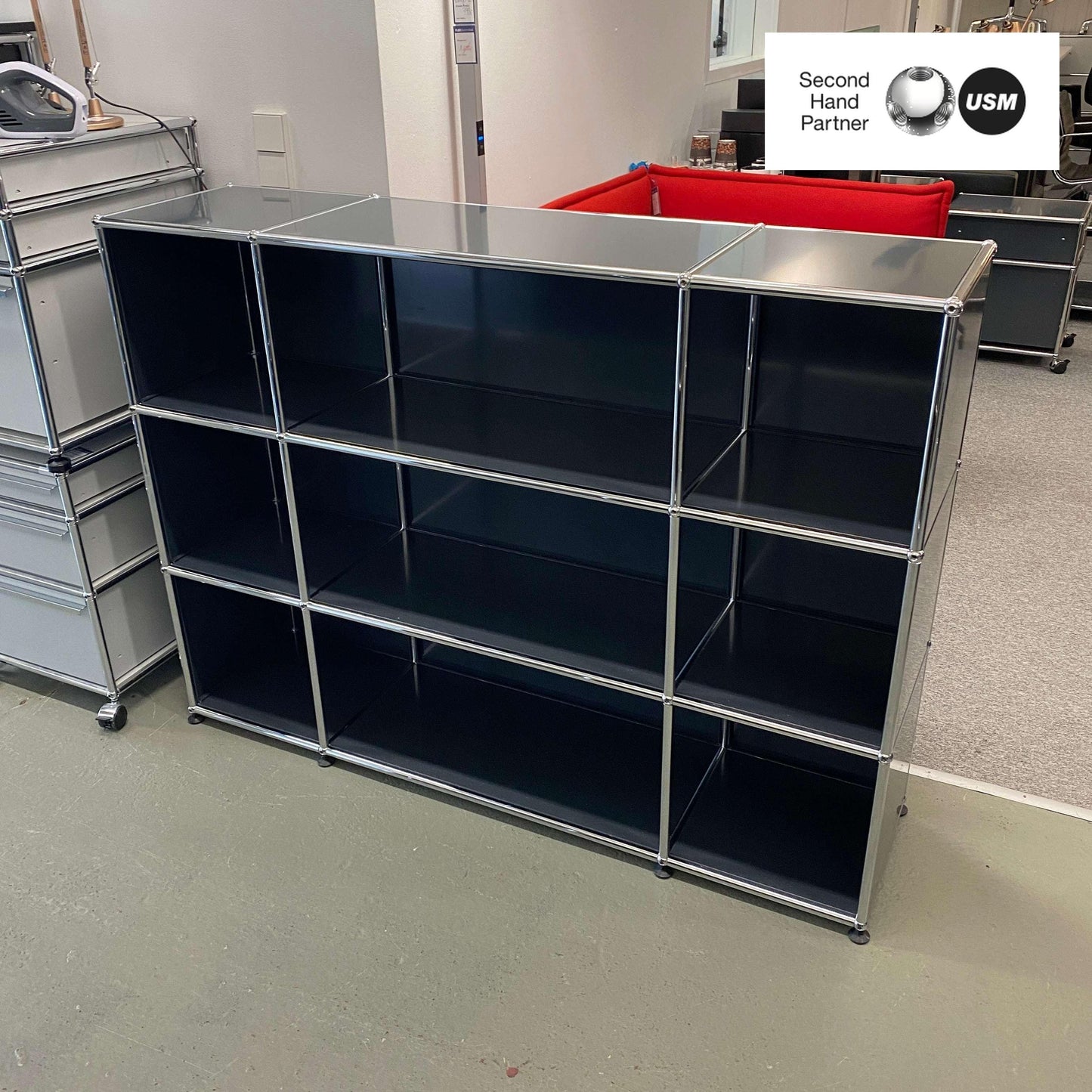 USM Haller Highboard anthracite with 3x3 open compartments, modern modular design bookshelf.