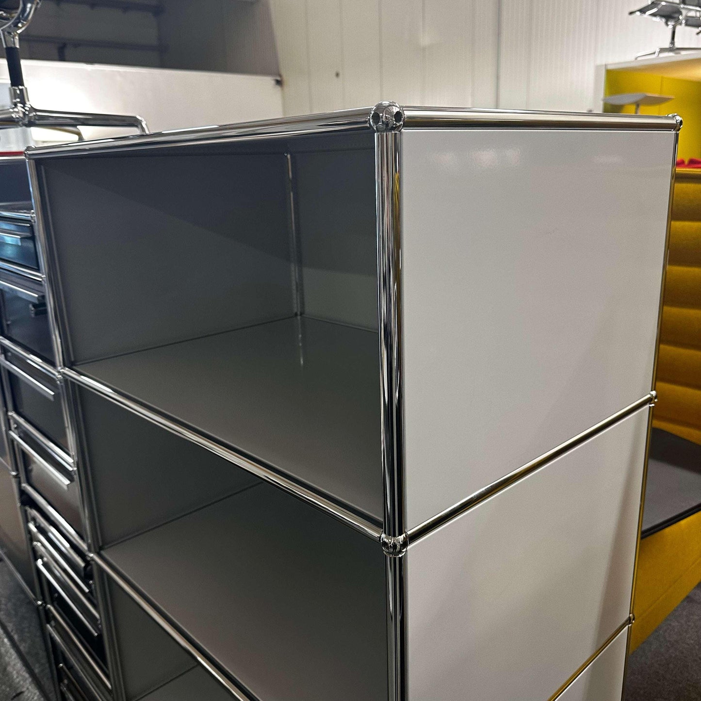 USM Haller light grey highboard with 1x4 open compartments and chrome frame, 77x144x50cm