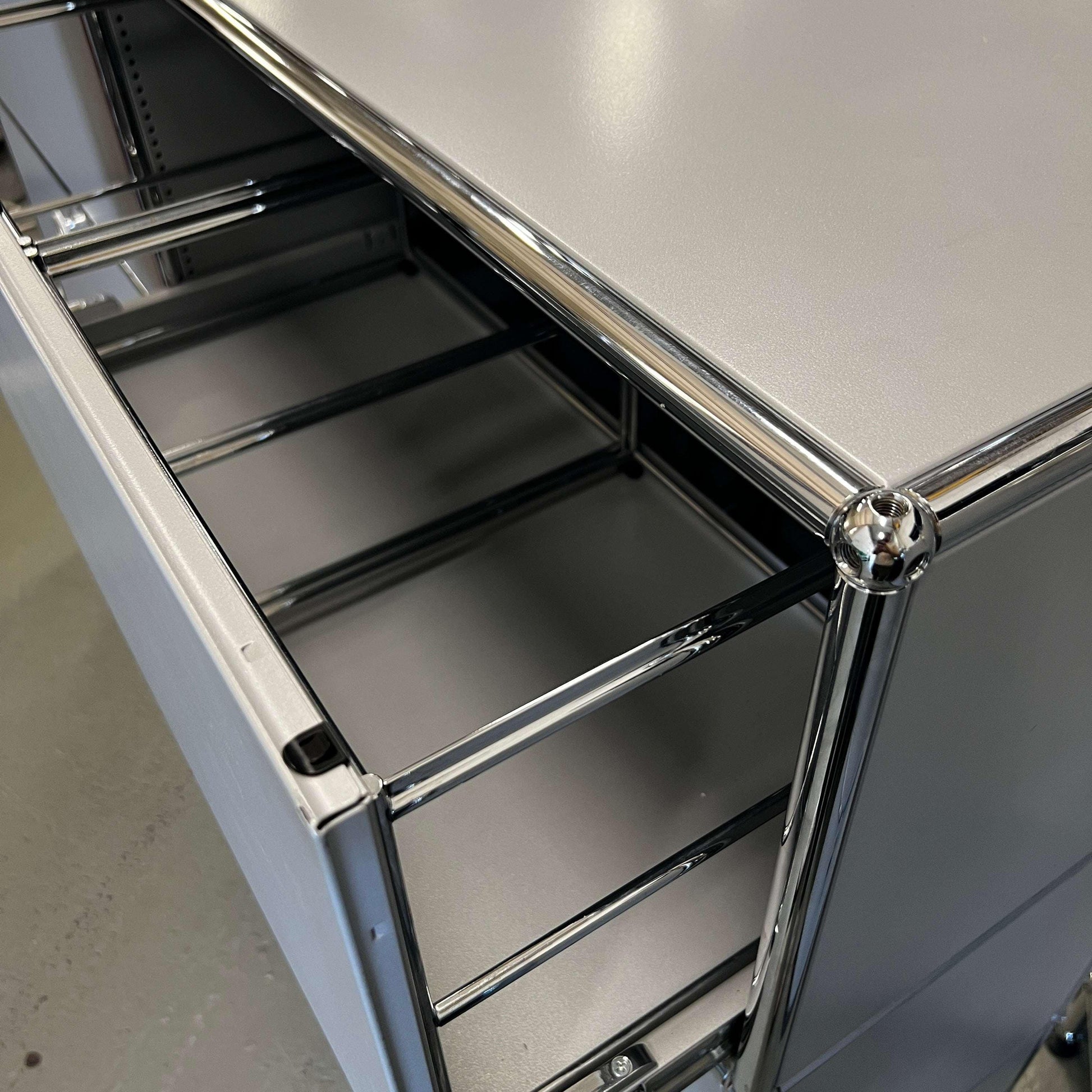 USM Haller Highboard in matt silver with six extendable drawers and optional hanging file inserts