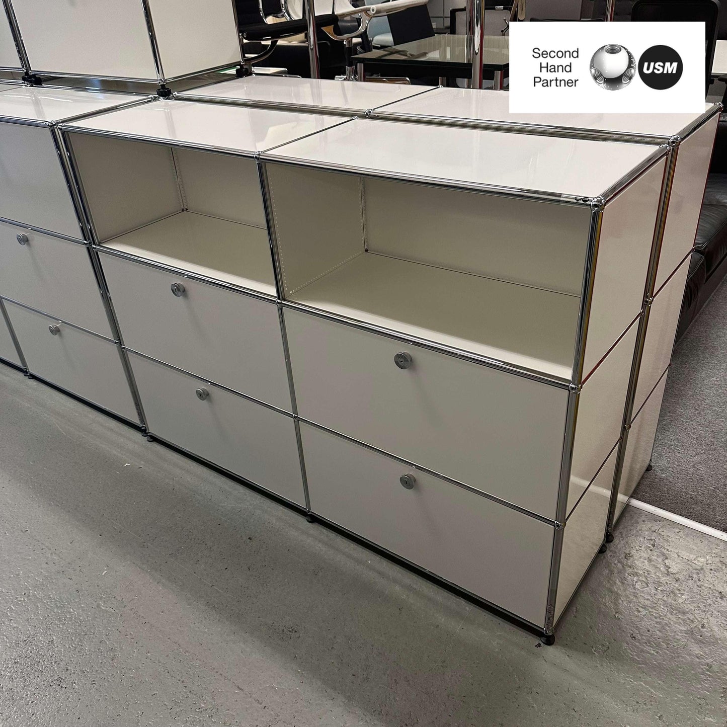 USM Haller white highboard with 4 flap doors and 35cm depth in modern modular design