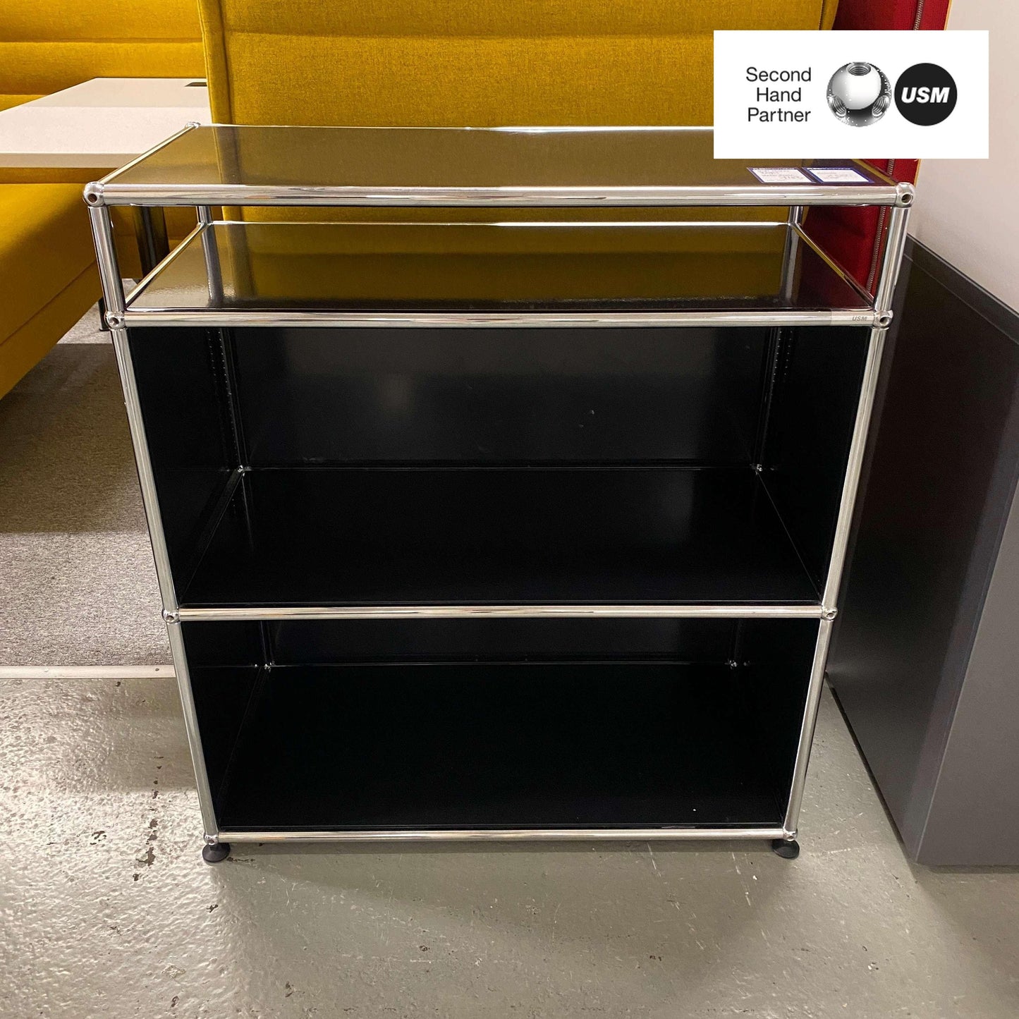 Black USM Haller Regal 1x3 shelving unit with chrome frame and three shelves