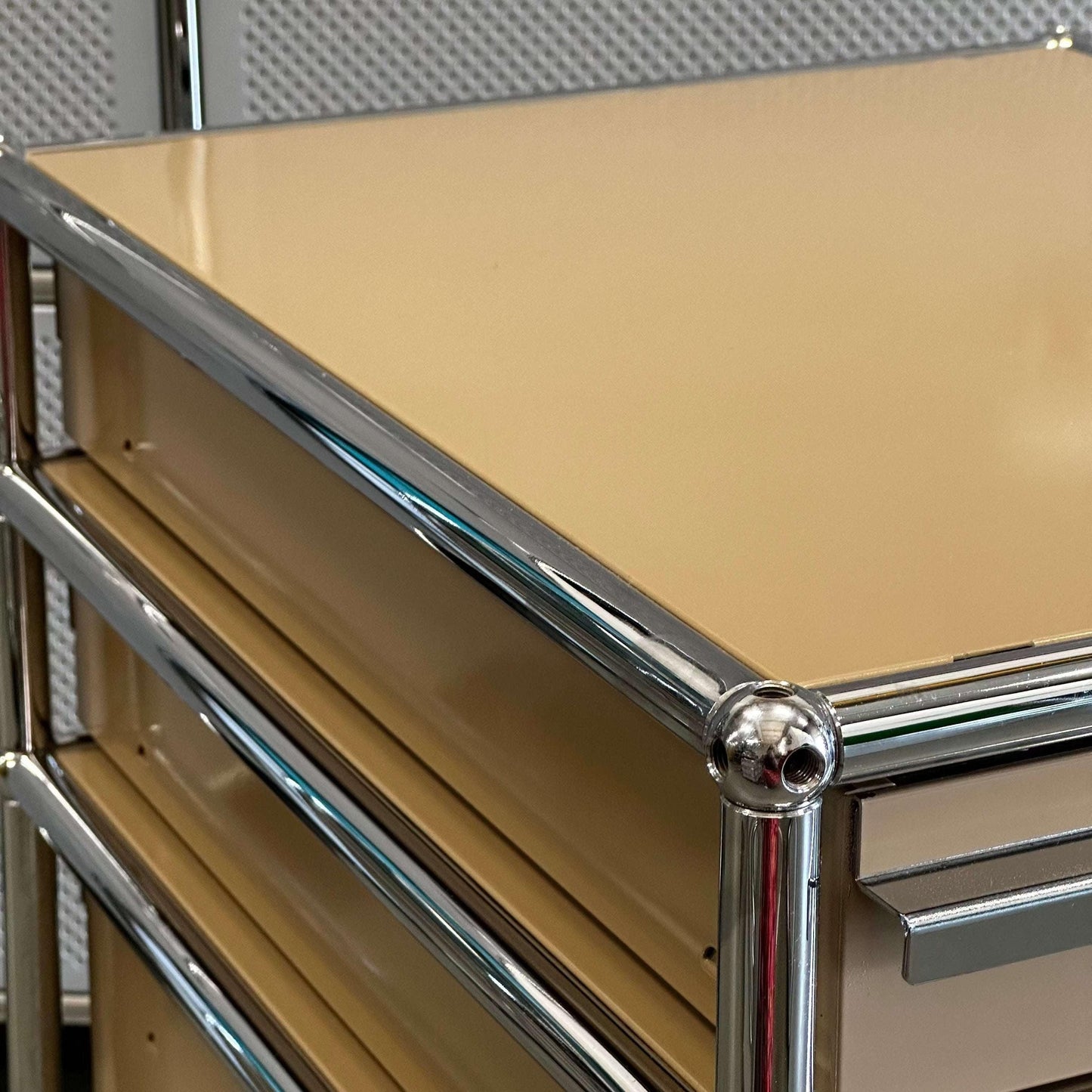 Beige USM Haller rollcontainer with chrome frame and four drawers
