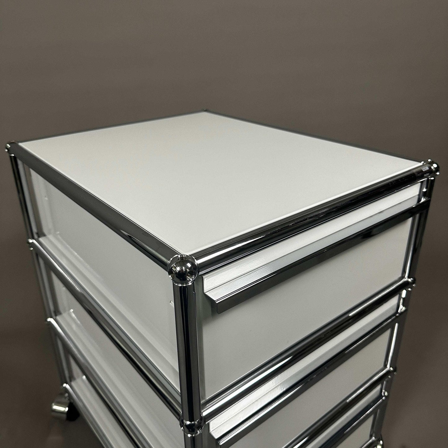 USM Haller light gray roll container with three drawers and chrome frame, 42x60x52 cm