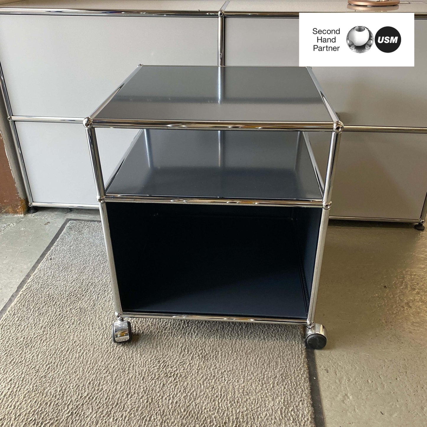 USM Haller Rollcontainer anthracite side table with open shelf and compact design on wheels, 53x53x62cm dimensions