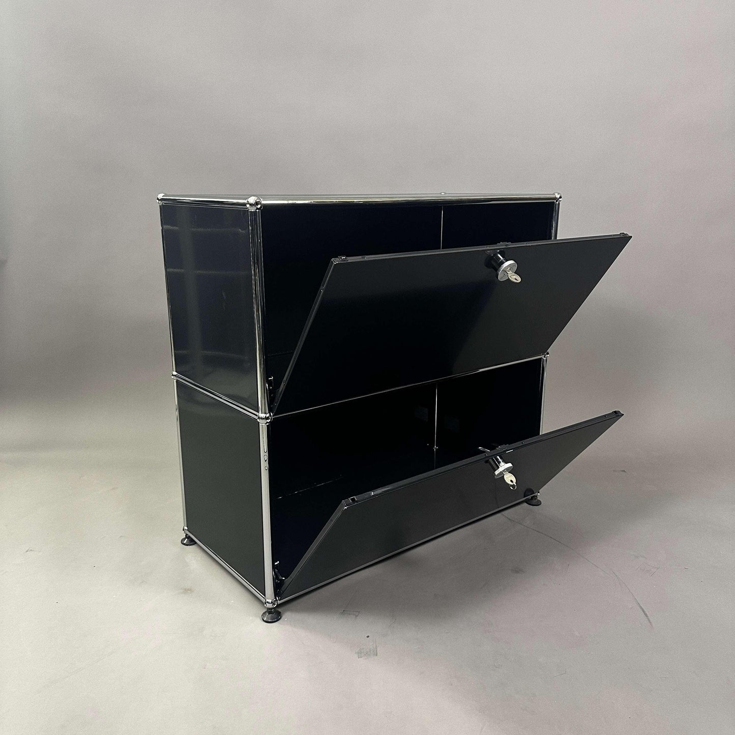 USM Haller Sideboard 1x2 in graphite black with two lockable flap doors and metal frame