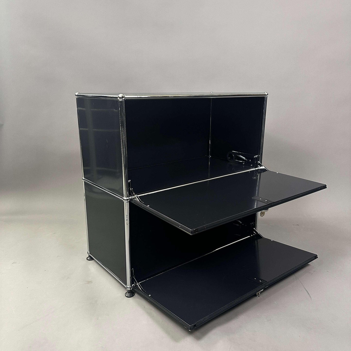 USM Haller Sideboard 1x2 in graphite black with two lockable drop-down doors
