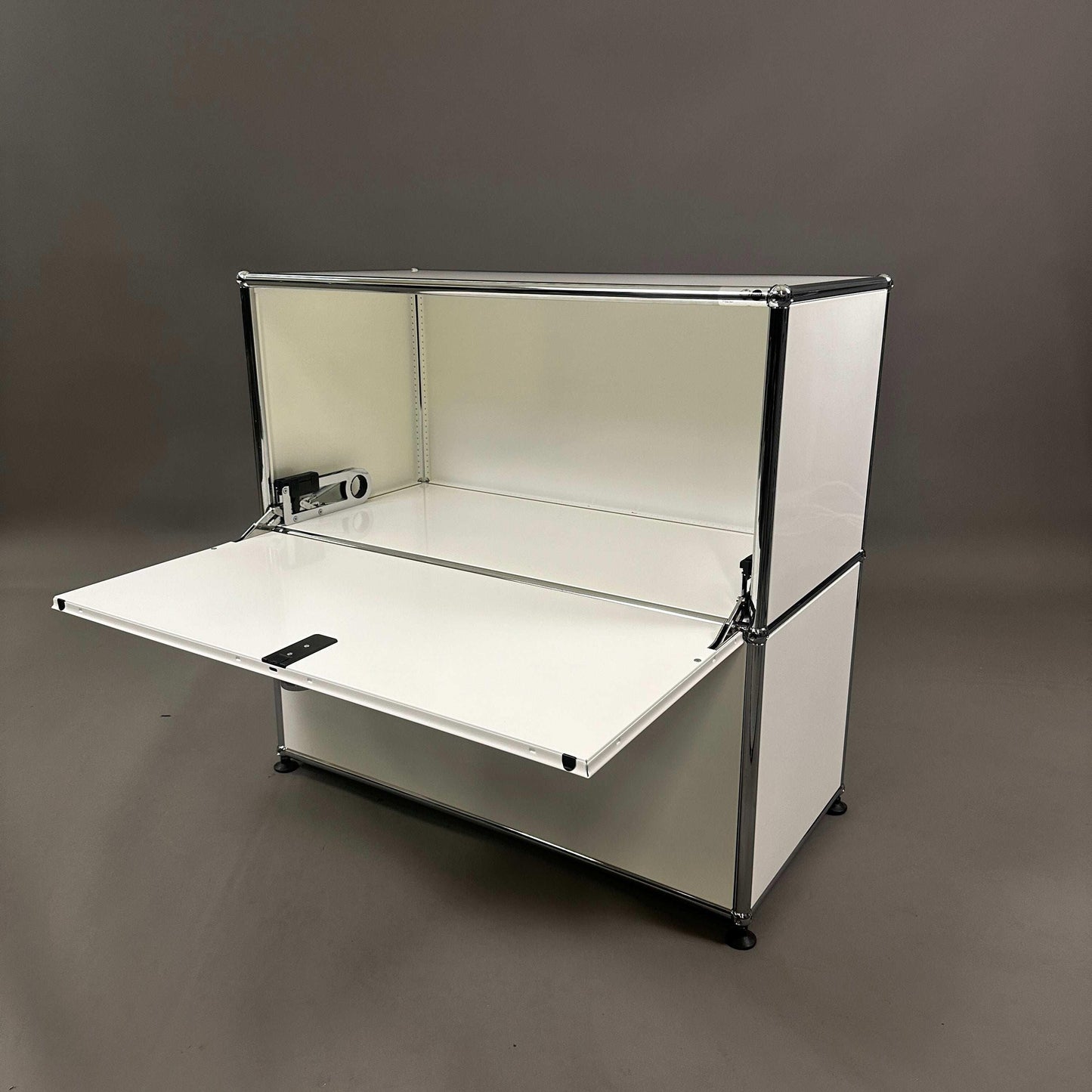 USM Haller white sideboard with two drop-down doors and chrome frame, dimensions 78x74x38 cm