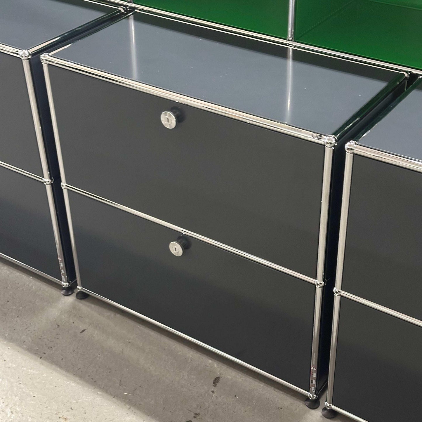 USM Haller Sideboard in anthracite color with two flap doors and chrome frame