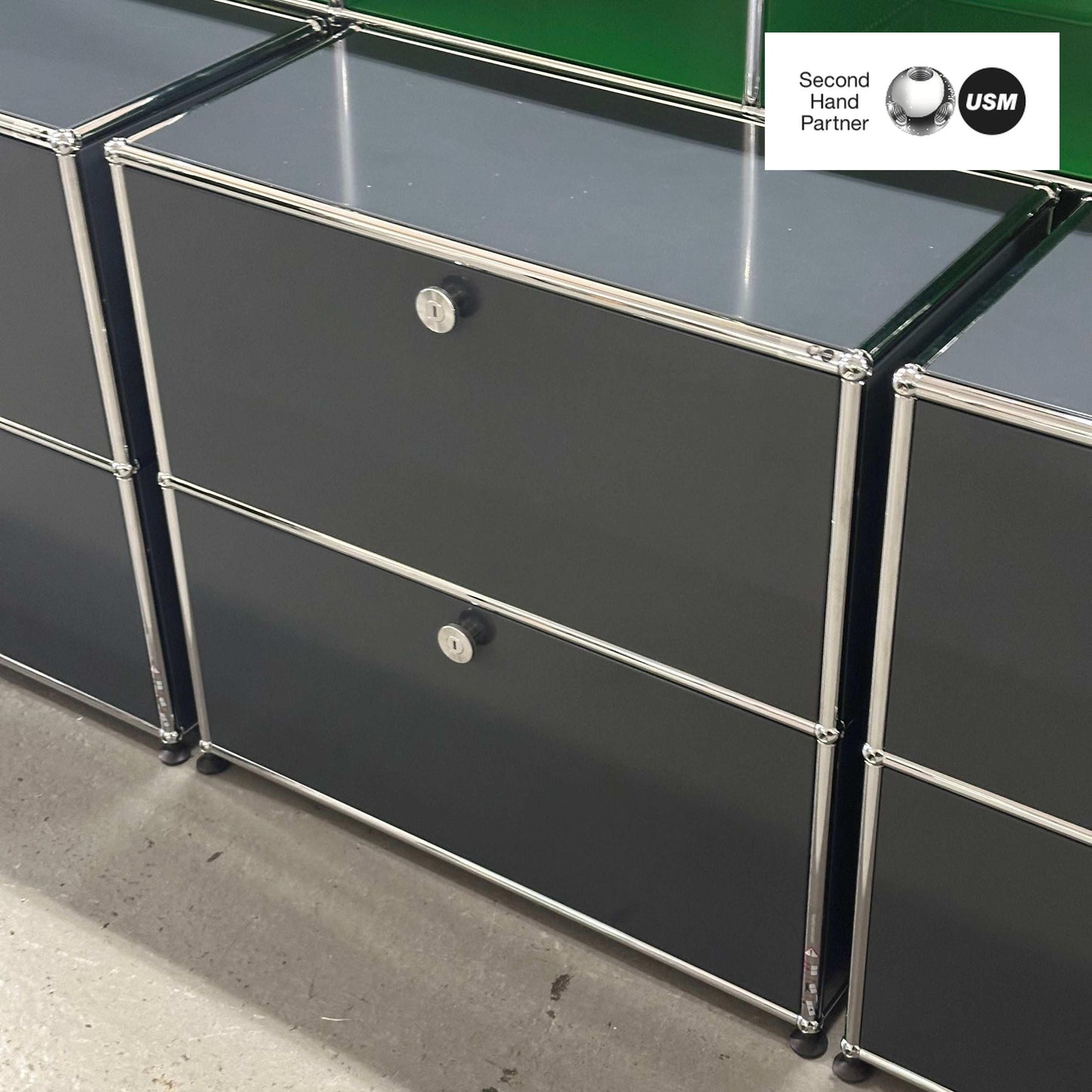 USM Haller Sideboard in anthracite color with two flap doors and chrome frame