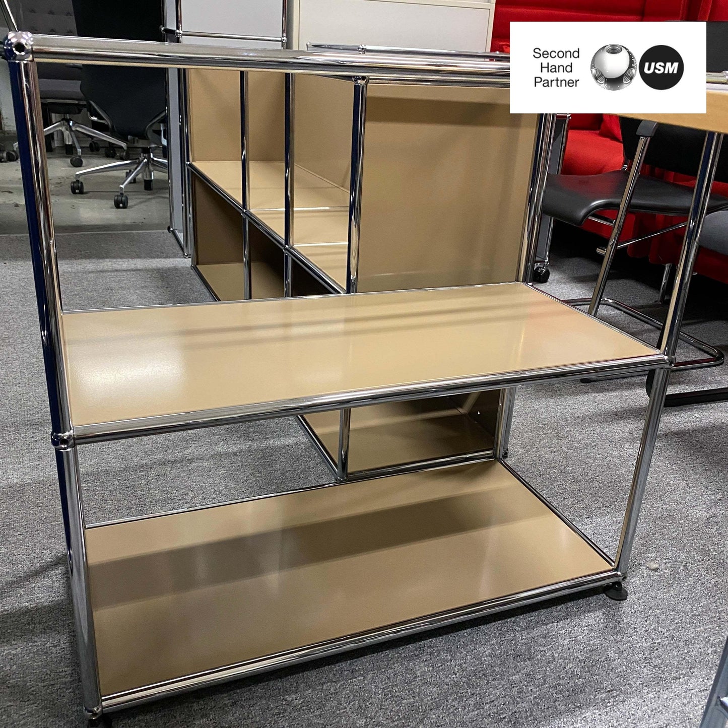 Beige USM Haller Sideboard with open shelves and chrome frame in office setting