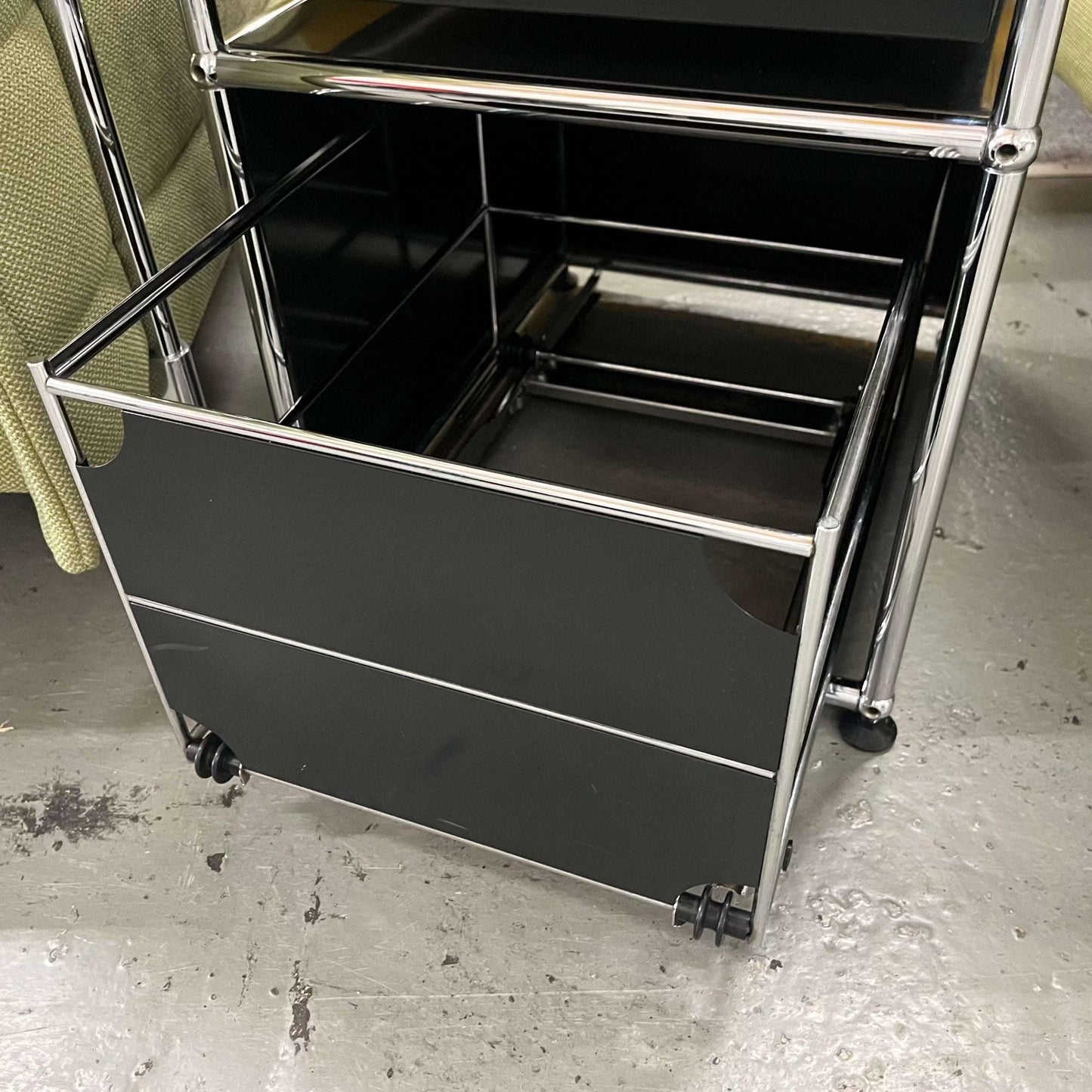 USM Haller black stand container with two drawers and hanging file compartment on wheels