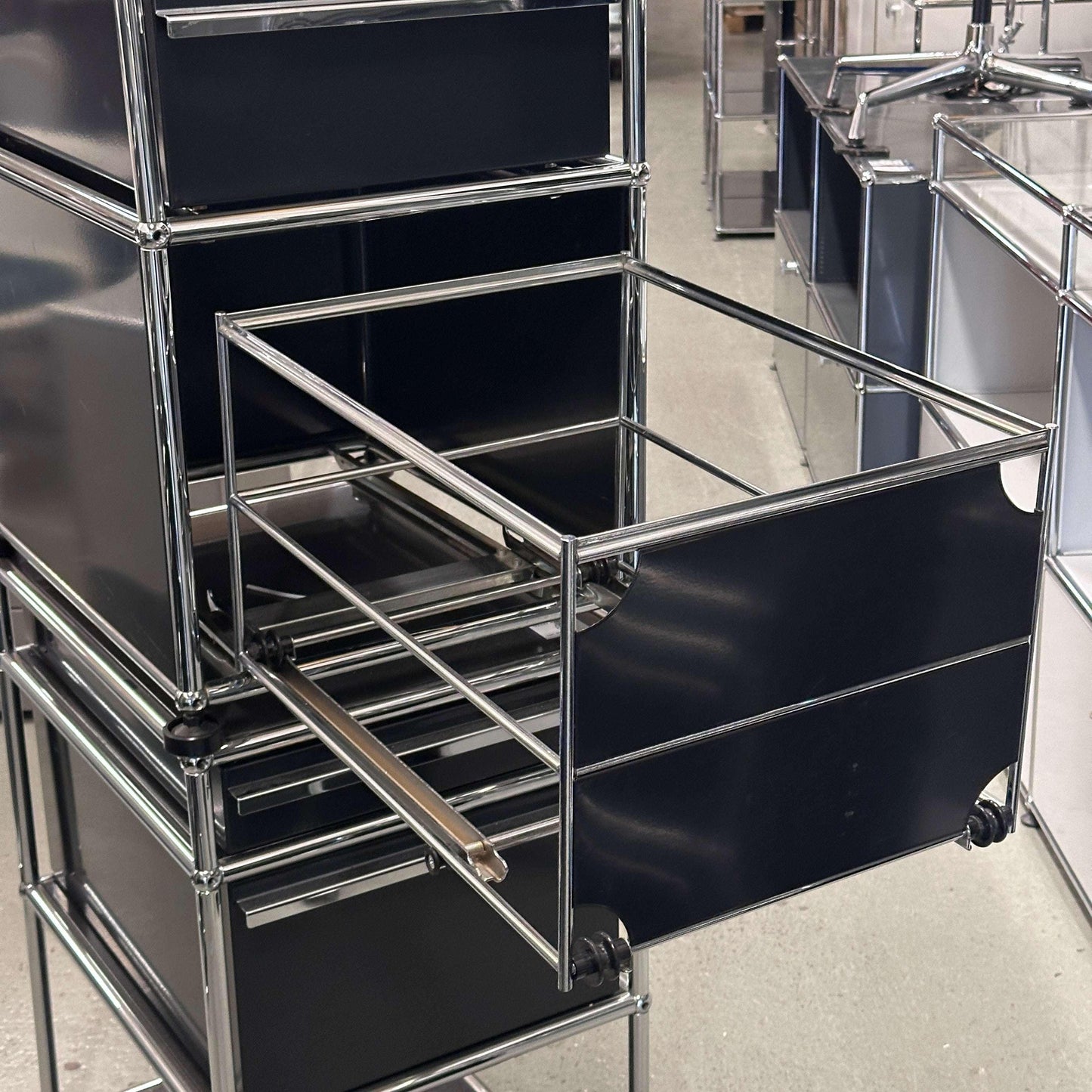 USM Haller Standcontainer in black with two drawers and hanging file compartment on wheels