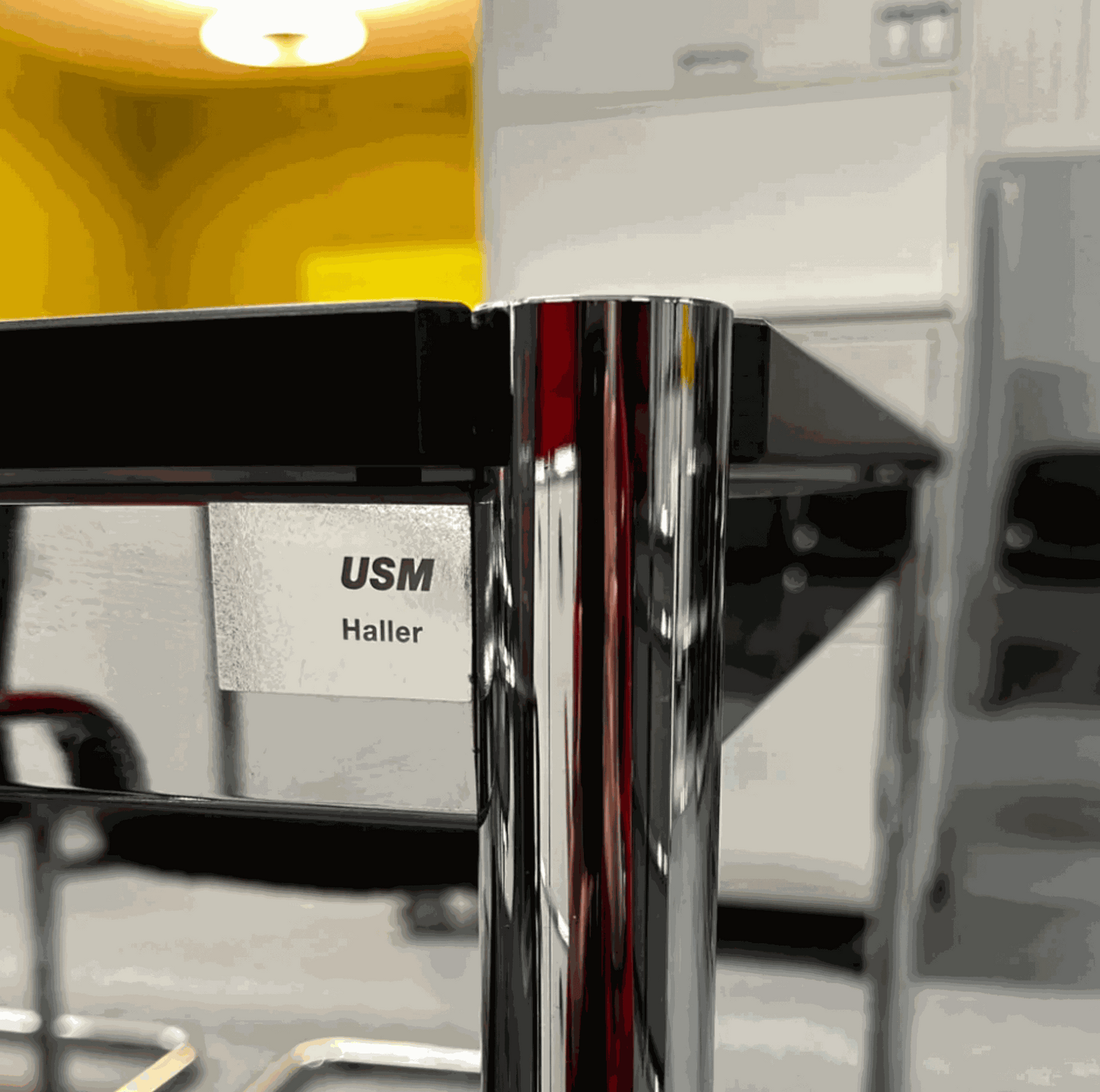 USM Haller Tisch with black lacquered oak tabletop and chrome frame, 200x75cm