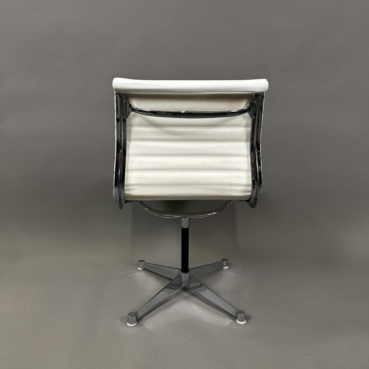 Vitra EA 101 white leather office chair with aluminum frame, non-swivel, no armrests, modern ergonomic design