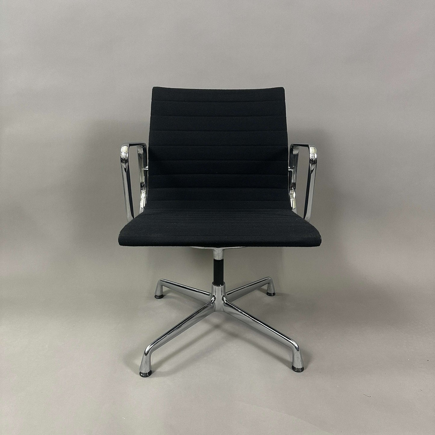 Vitra EA 108 black hopsak office chair with chrome frame and swivel base