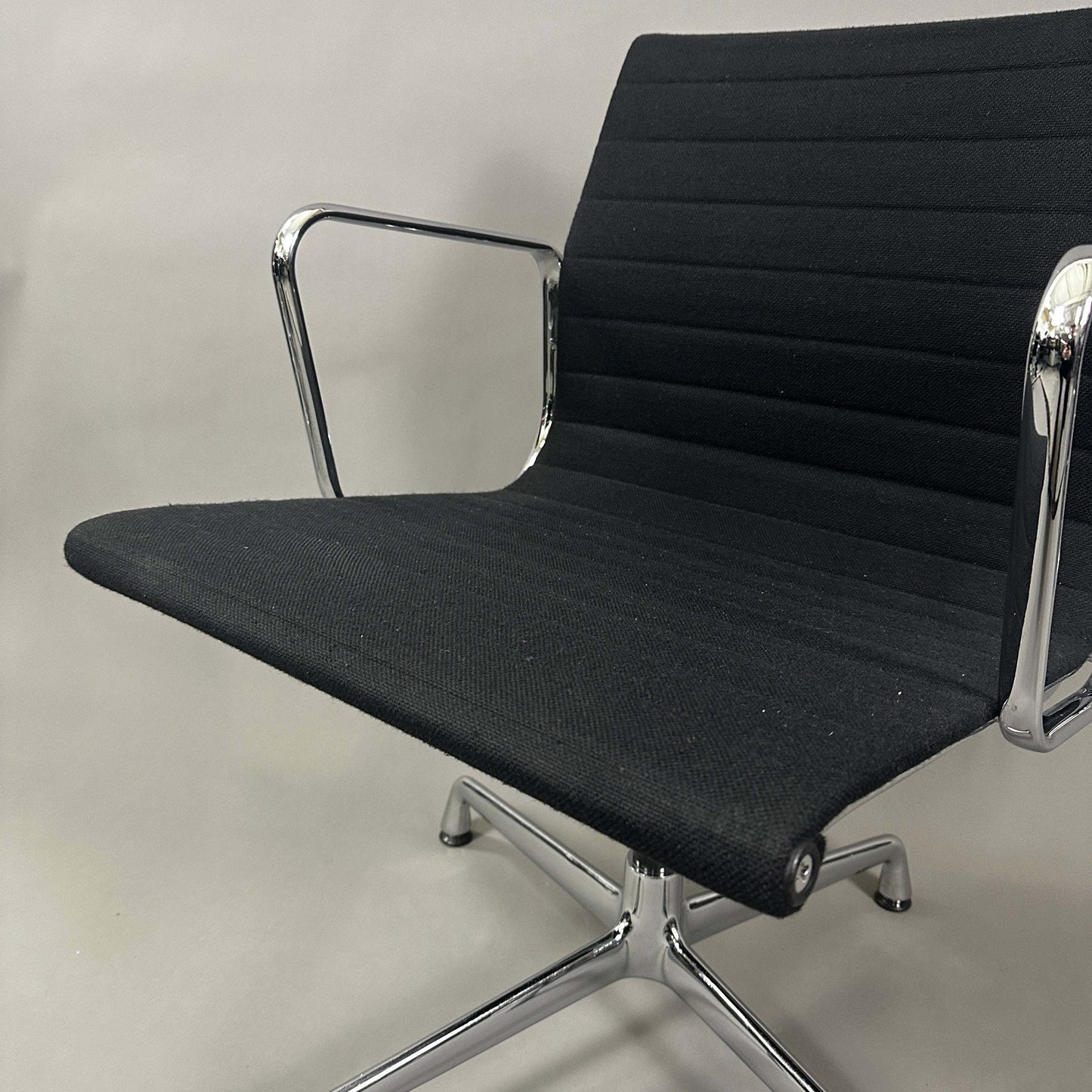 Vitra EA 108 black Hopsak fabric office chair with chrome frame and swivel base