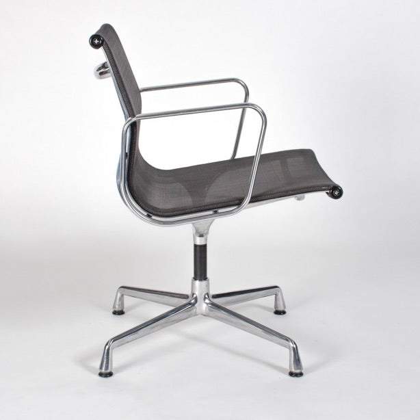 Vitra EA 108 anthracite swivel office chair with mesh seat and chrome frame
