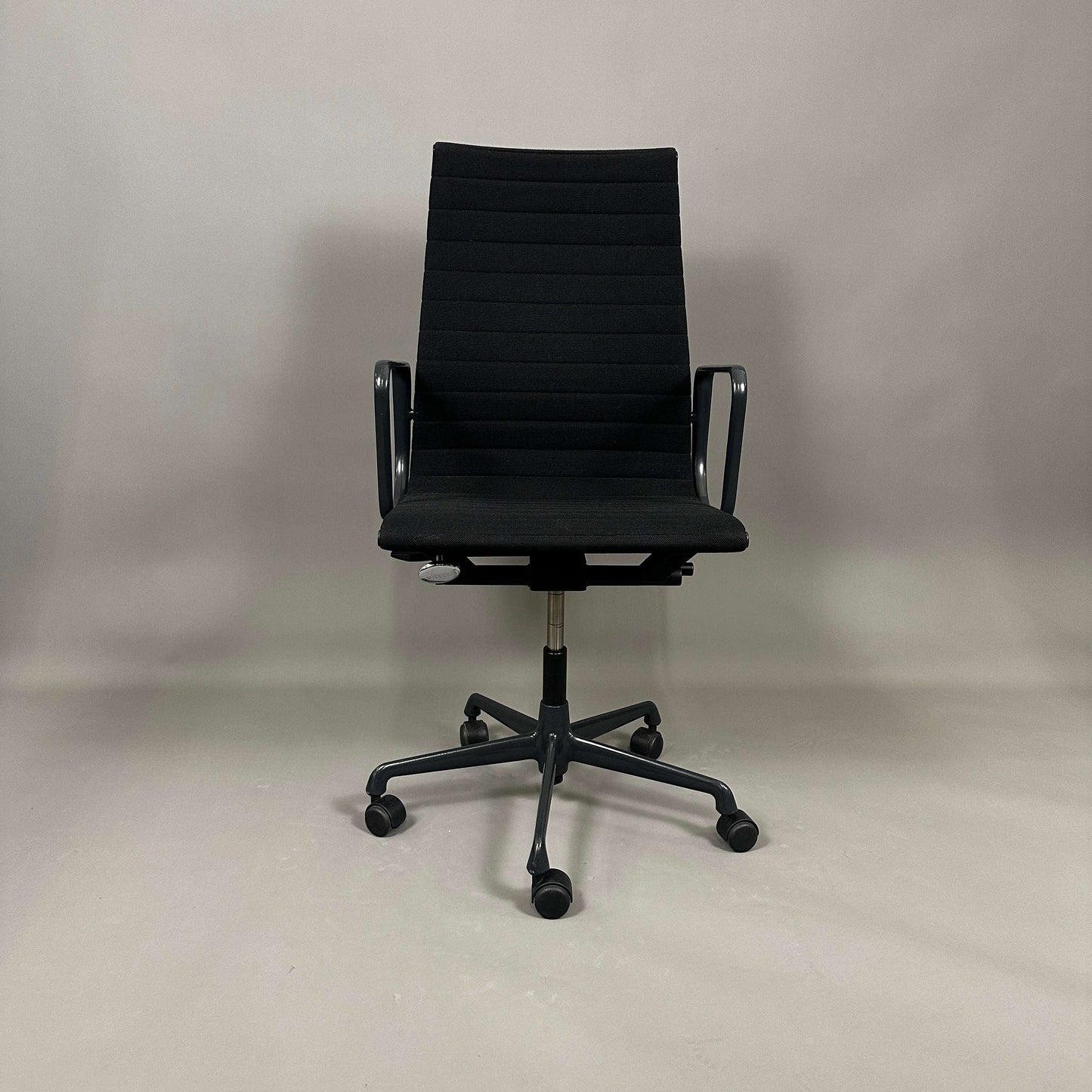 Vitra EA 119 Hopsak black office chair with adjustable recline, gas lift seat height, and black aluminum five-star base