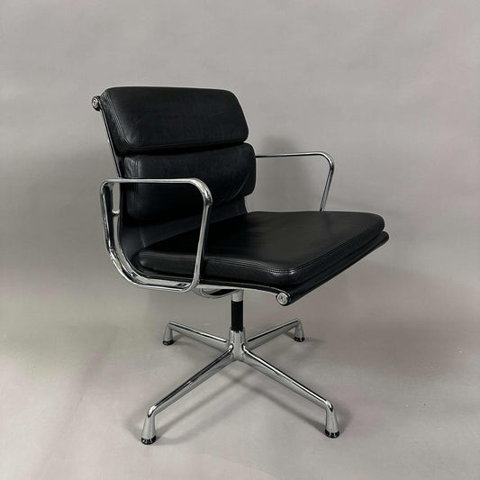 Black Vitra EA 208 Soft Pad Chair with padded leather seat and chrome swivel frame