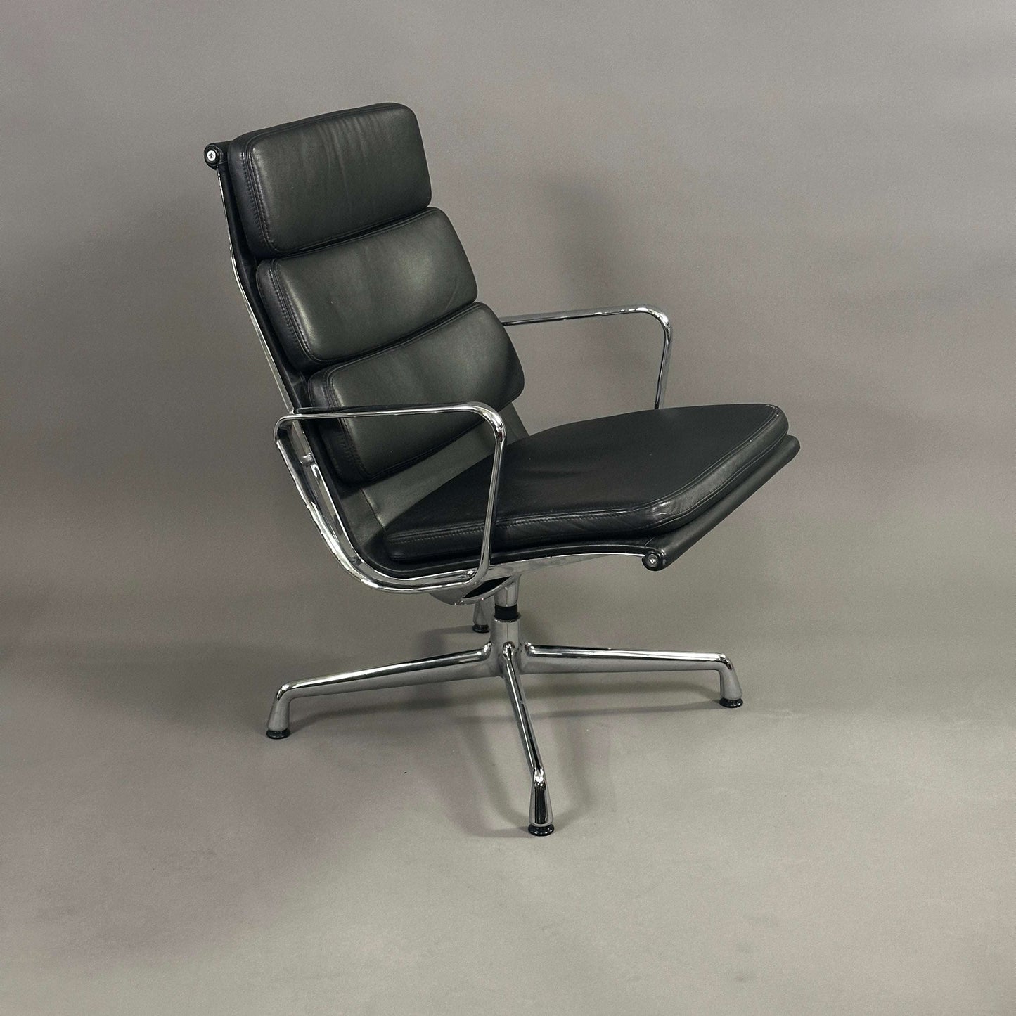 Vitra EA 216 black soft pad leather swivel chair with chrome frame