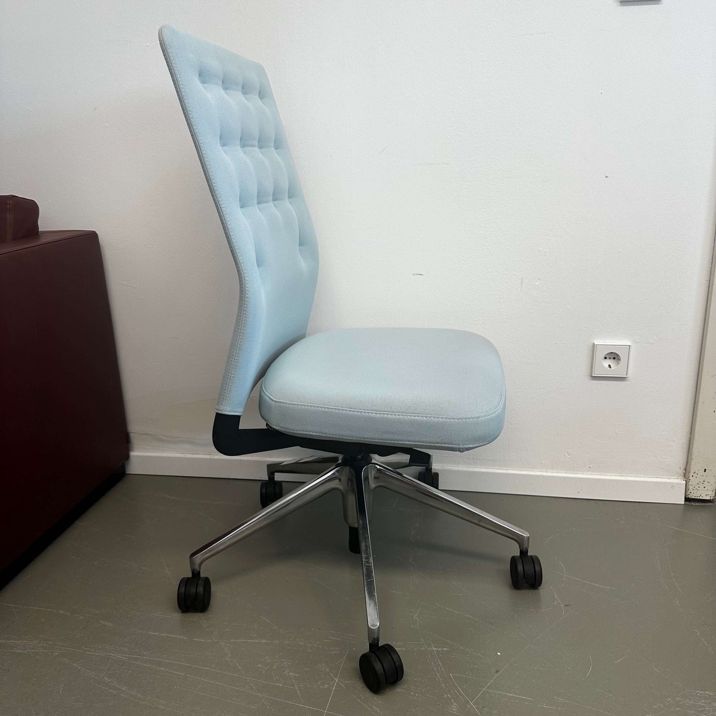 Vitra ID Trim light blue office chair with patented mechanism, adjustable recline, lumbar support, and seat depth adjustment