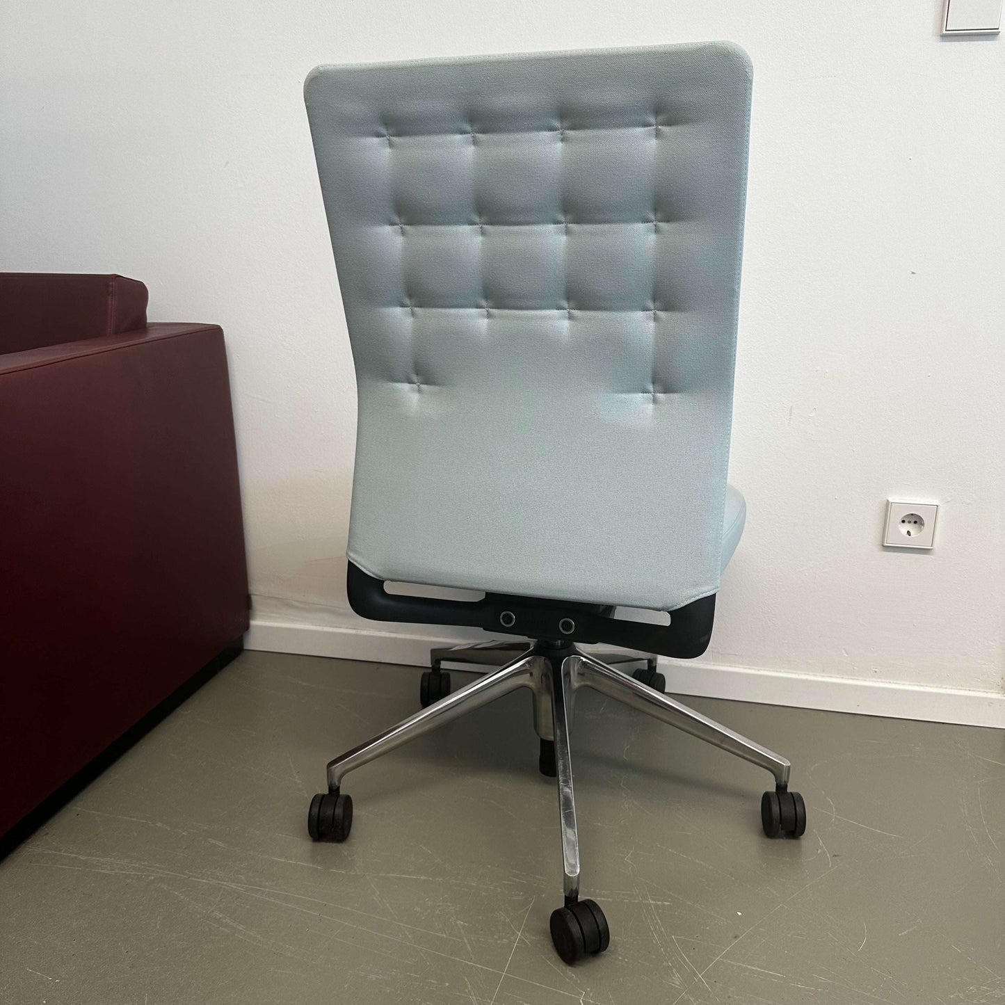 Vitra ID Trim light blue office chair with adjustable lumbar support and ergonomic design