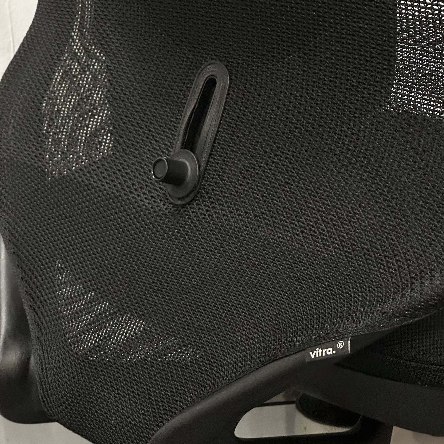 Vitra Meda Pro black ergonomic office chair with adjustable lumbar support and breathable double-layer mesh backrest