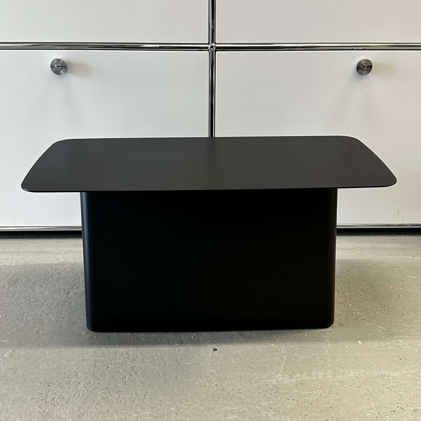 Vitra Metal Side Table in matte black metal with minimalist rectangular design suitable for indoor and outdoor use