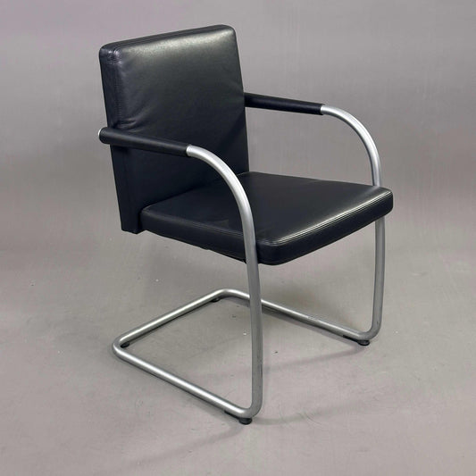 Vitra Visasoft chair with black leather upholstery and chrome cantilever frame