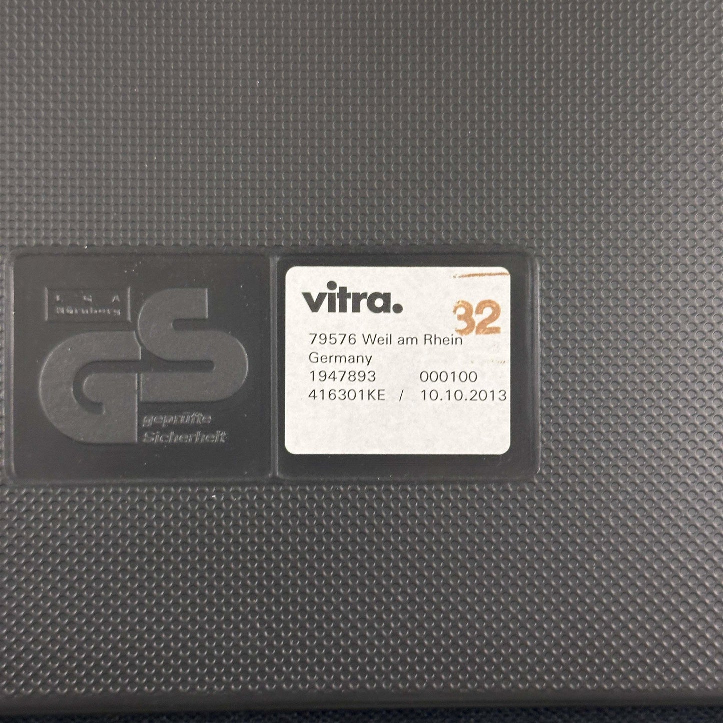 Vitra Visasoft black leather chair label with GS safety certification and manufacturing details