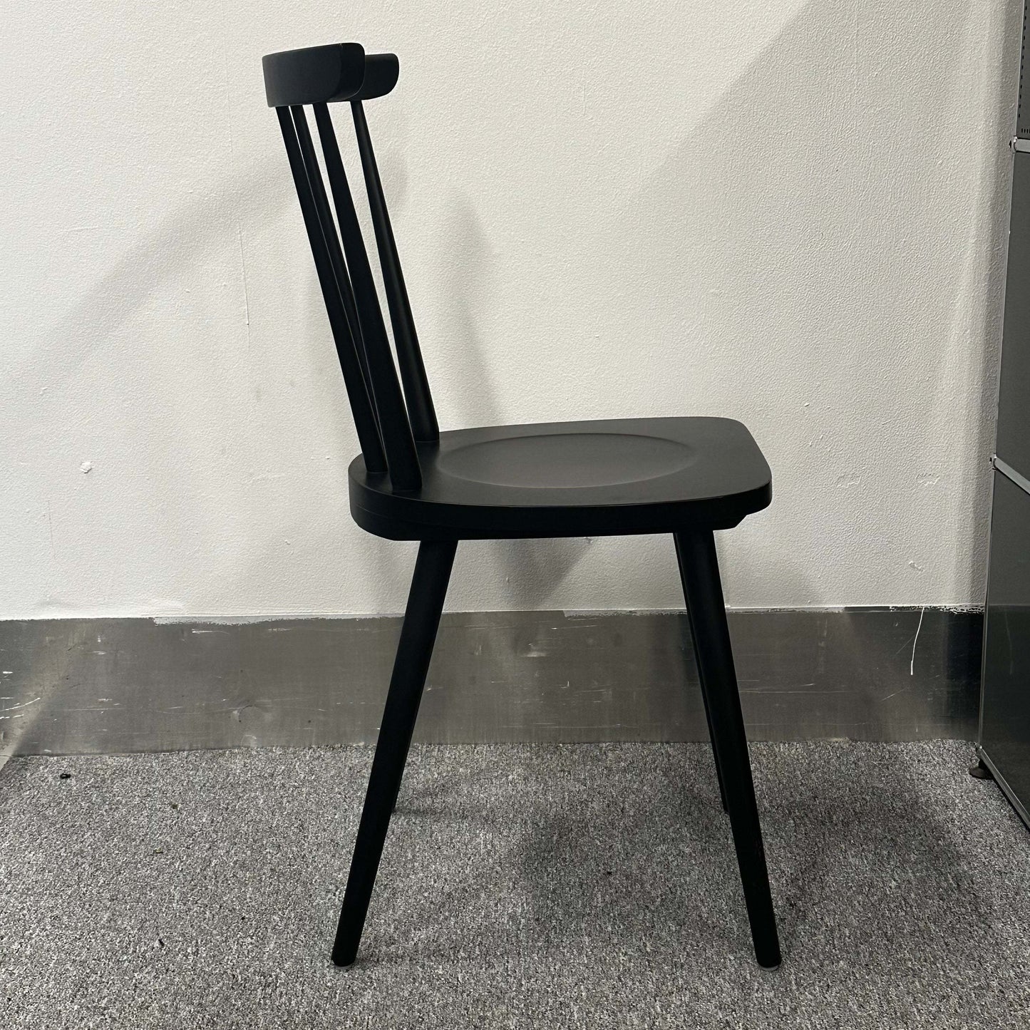 Wagner W-1960 Chairity black wooden chair with minimalist design and ergonomic backrest.