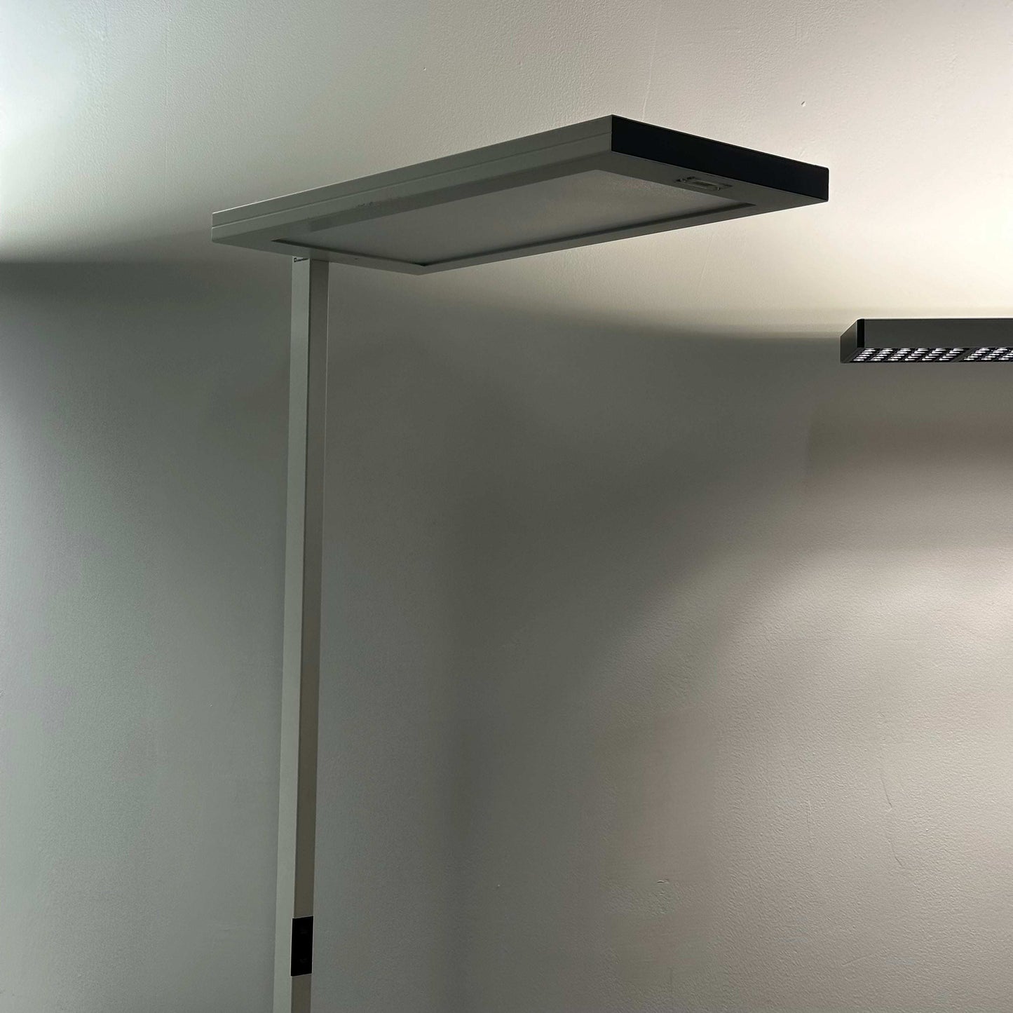 Waldmann Lavigo LED white floor lamp with integrated PIR motion and daylight sensor, 85W, 12,400 lumens, 4000K color temperature